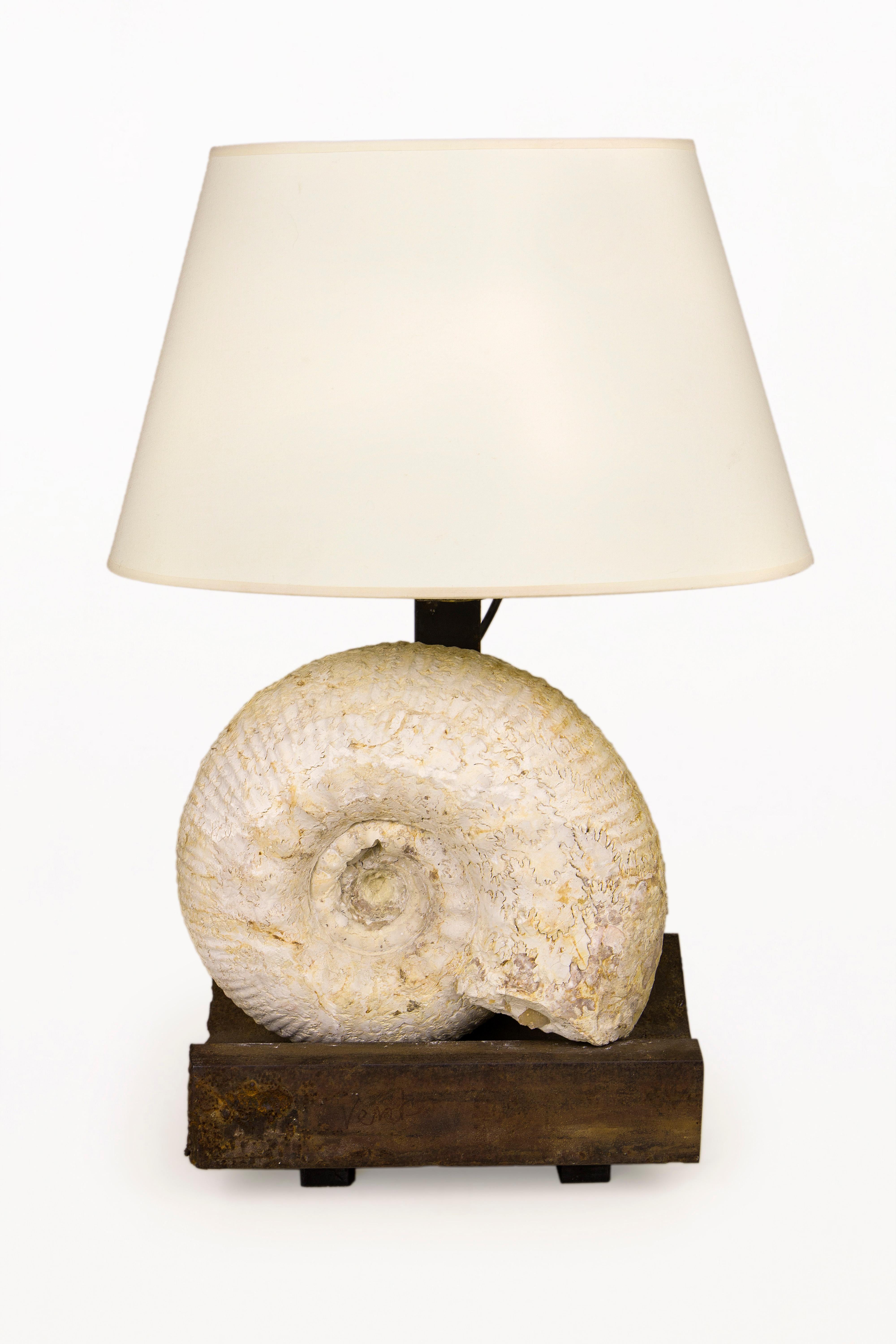 Pair of Jean-Charles Moreux table lamps
Fossil Table lamps with metal base,
circa 1940, France.
Very good vintage condition.
French designer Jean-Charles Moreux was one of the best designers working in the 1930s. He often used fossils in his