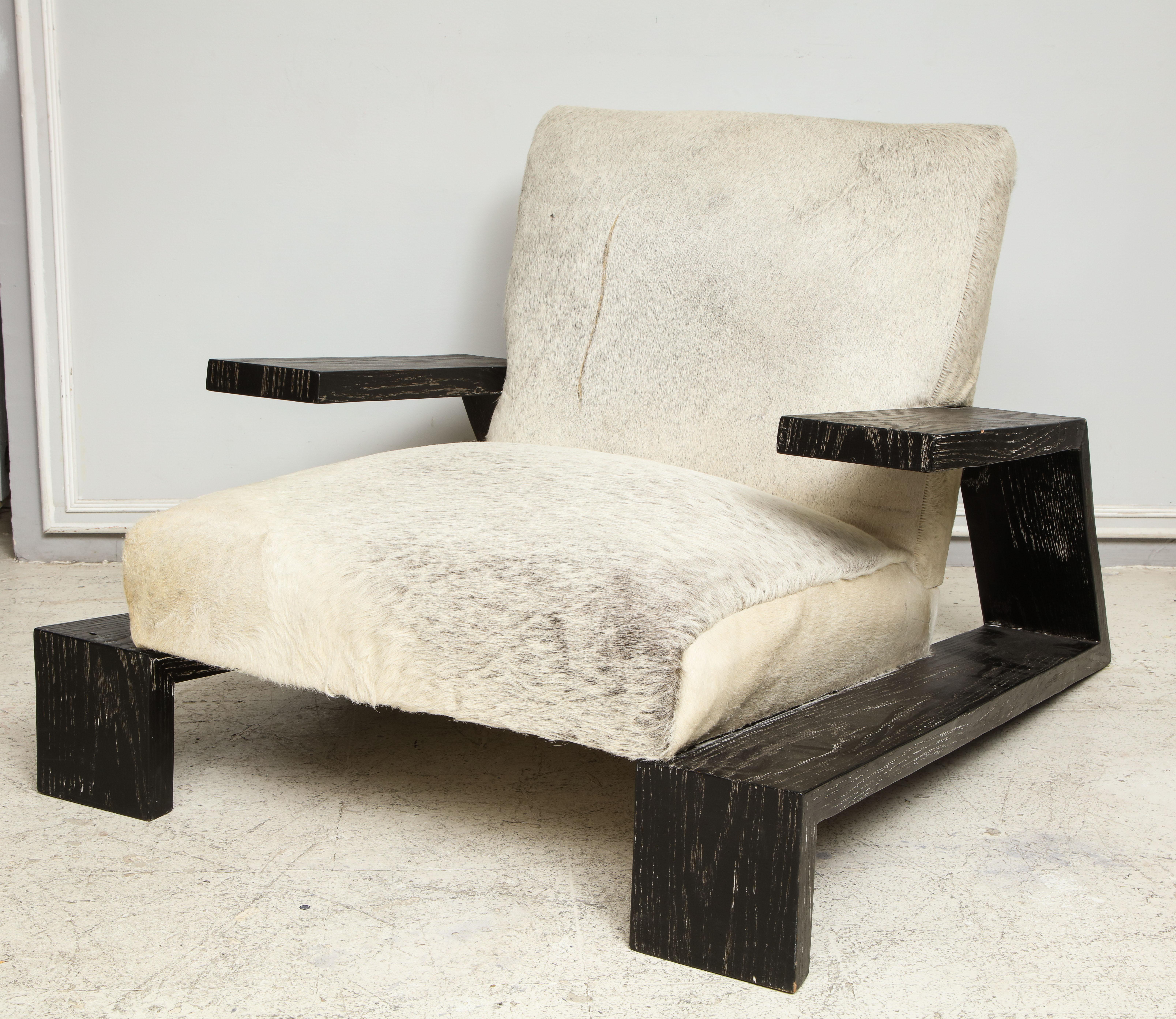 French Pair of Jean-Michel Frank Style Cerused Oak Lounge Chairs Upholstered in Cowhide