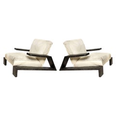 Pair of Jean-Michel Frank Style Cerused Oak Lounge Chairs Upholstered in Cowhide