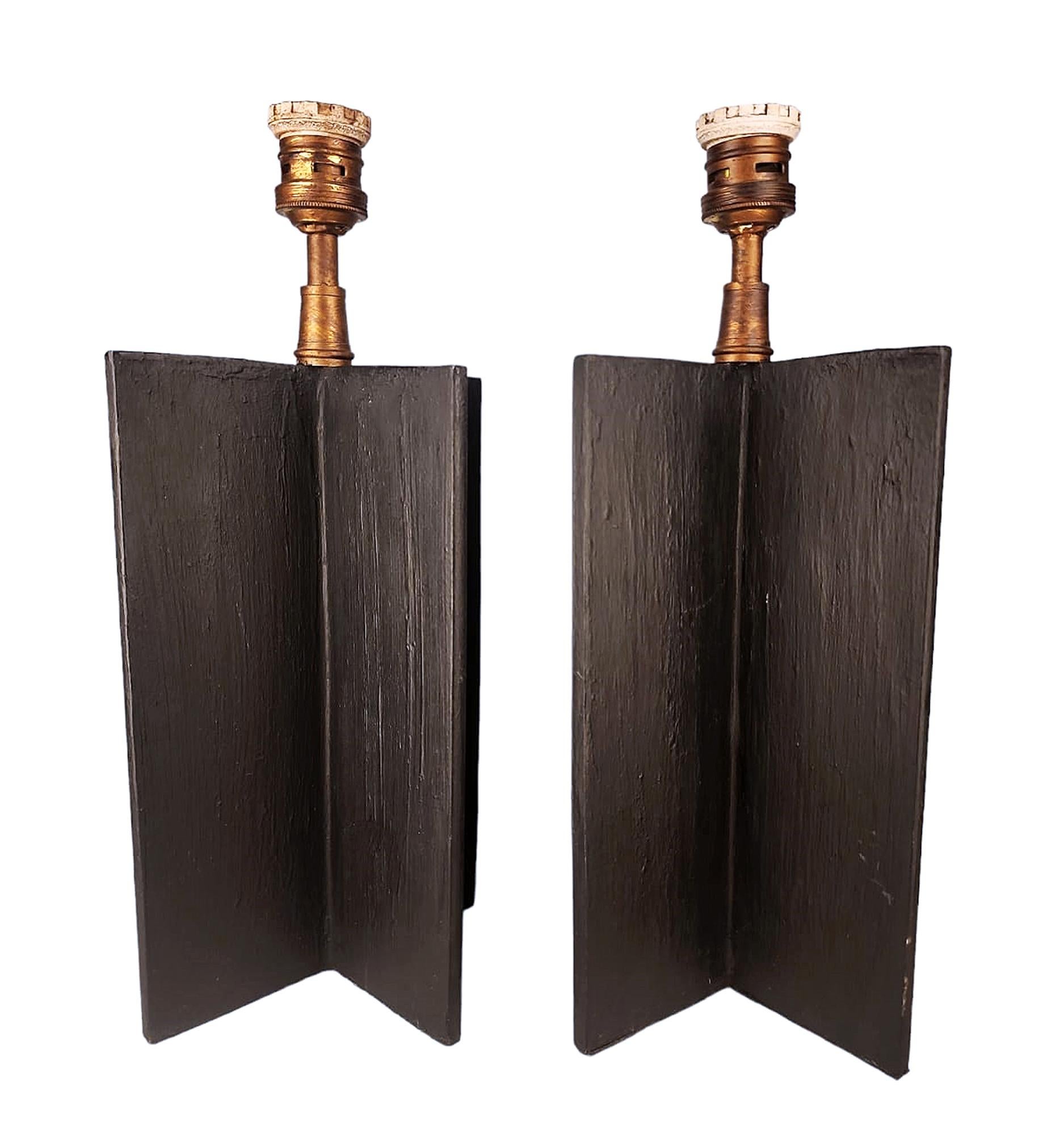 Pair of Jean-Michel Frank's iron 'Croisillon' design table lamps for argentine Company Comte

By: Jean-Michel Frank, Comte S.A.
Material: iron, metal, cord
Technique: cast, molded, pressed, metalwork, forged, hand-crafted
Dimensions: 5.5 in x 5.5 in