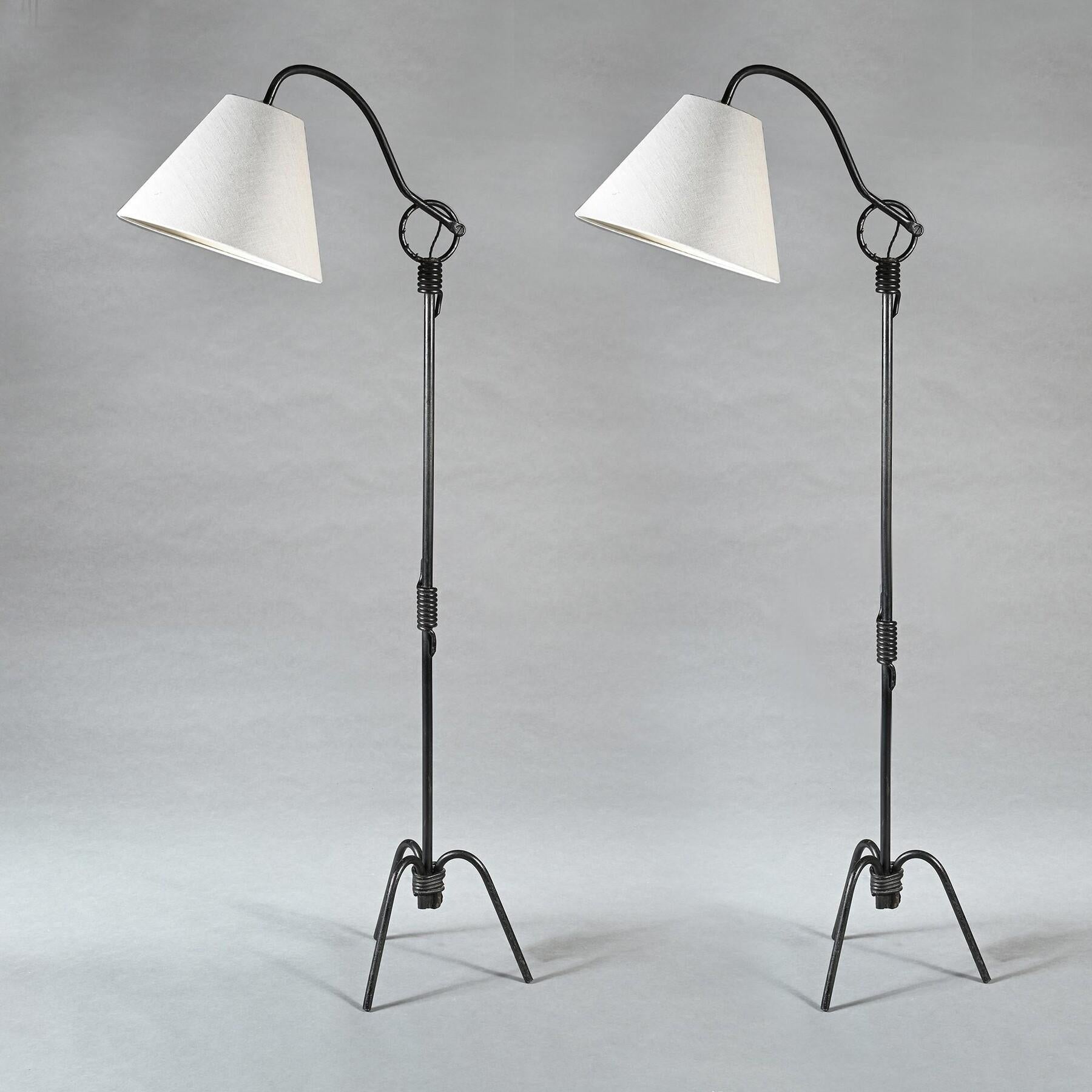 A Matched Pair of Jean Royère adjustable Iron standing Floor Lamp

France Paris circa 1940’s

Both in wonderful original condition by one of the most sought after mid 20th century French furniture and interior designers Jean Royère (1902-1981). 
The