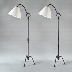 Paire de lampadaires réglables en fer de Jean Royère 1940