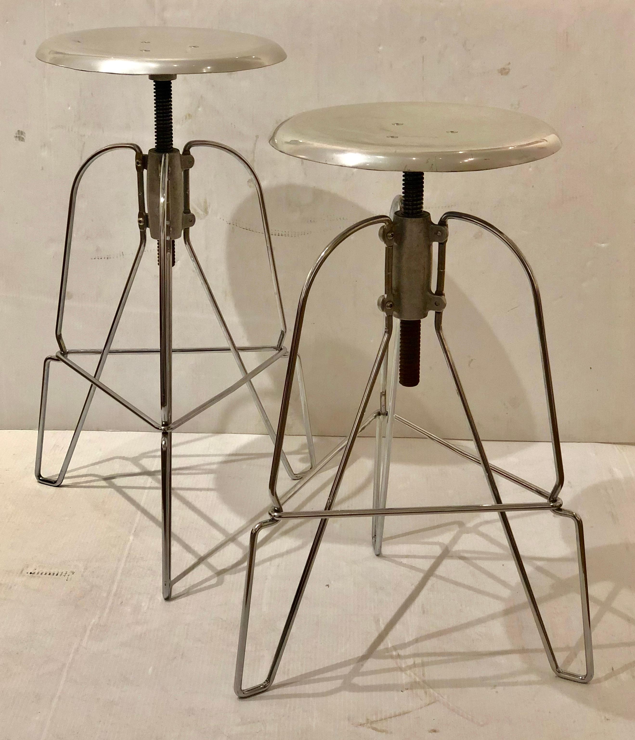 Pair of Jeff Covey for Herman Miller model 6 stools. The legs are steel on chrome with aluminum swivel seat. The height is adjustable 25-32. This are early edition one of the seats shows more wear and a couple of dings do to age and use these set