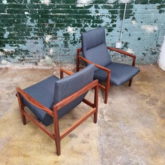 Pair of Jens Risom Floating Walnut Lounge Chairs