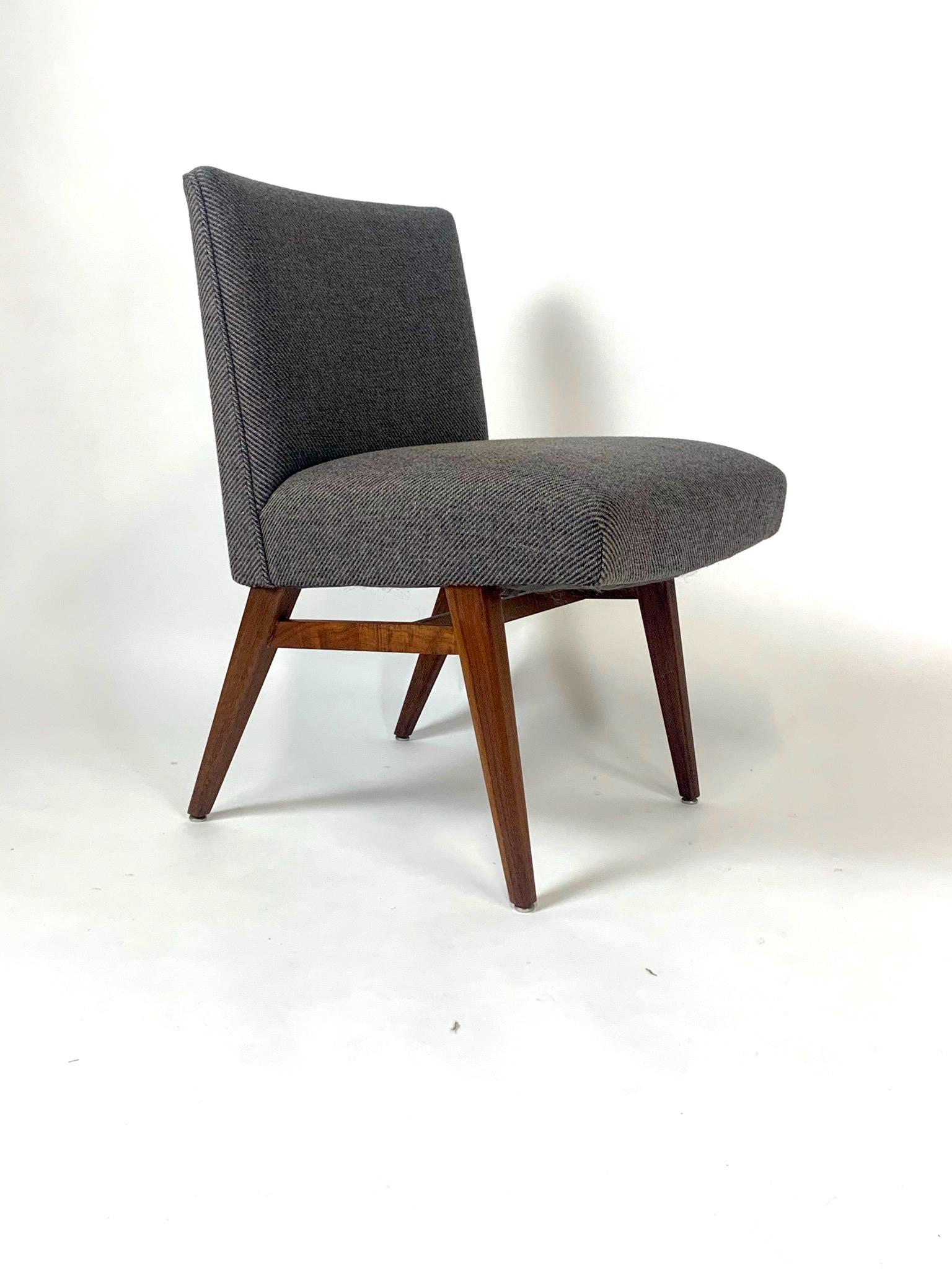 Jens Risom pair of chairs- Model#205. This is a really great unique style in that the height and construction is styled to be either a dining chair, a desk chair, or can be used as occasional lounge or slipper chairs. They are quite comfortable.