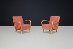 Coppia di poltrone Halabala di Jindřich con braccioli in bengala biondo e origine. Tappezzeria