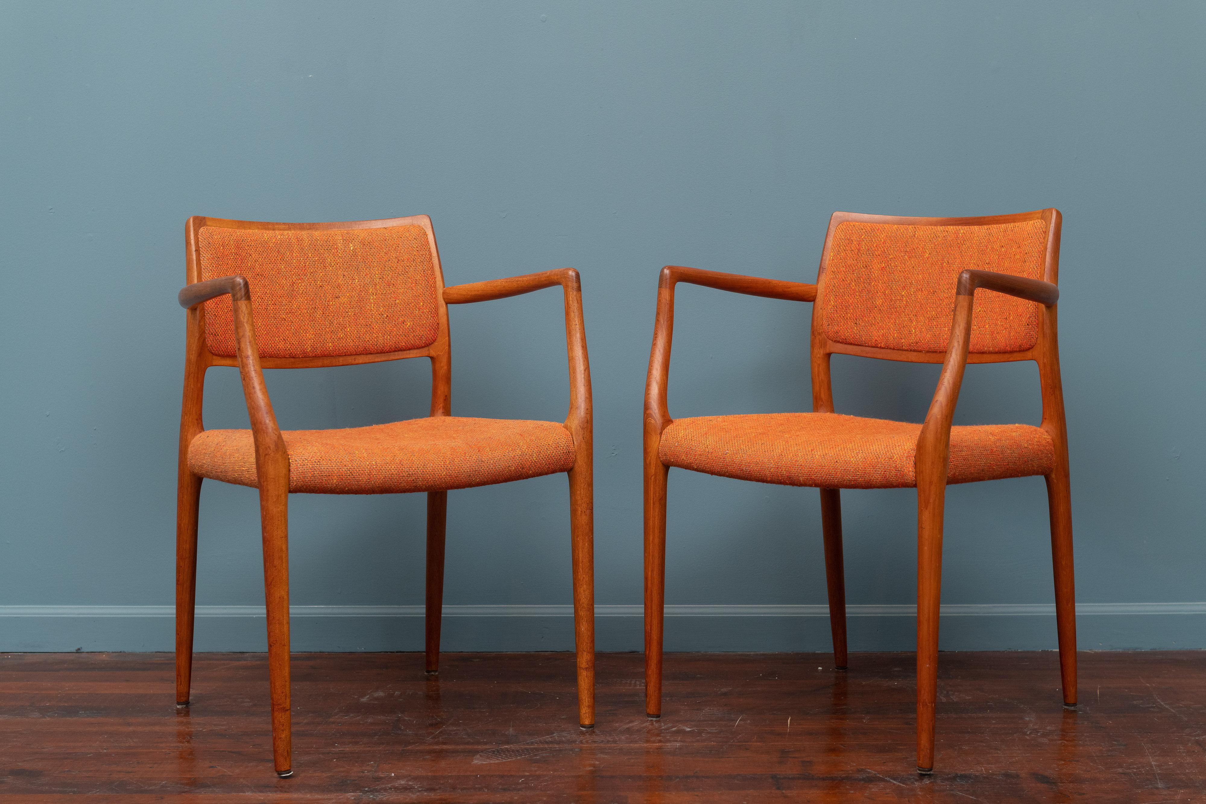 Pair of J.L. Moller teak armchairs, model 80 for Niels Moller Denmark. In very good original condition, signed.