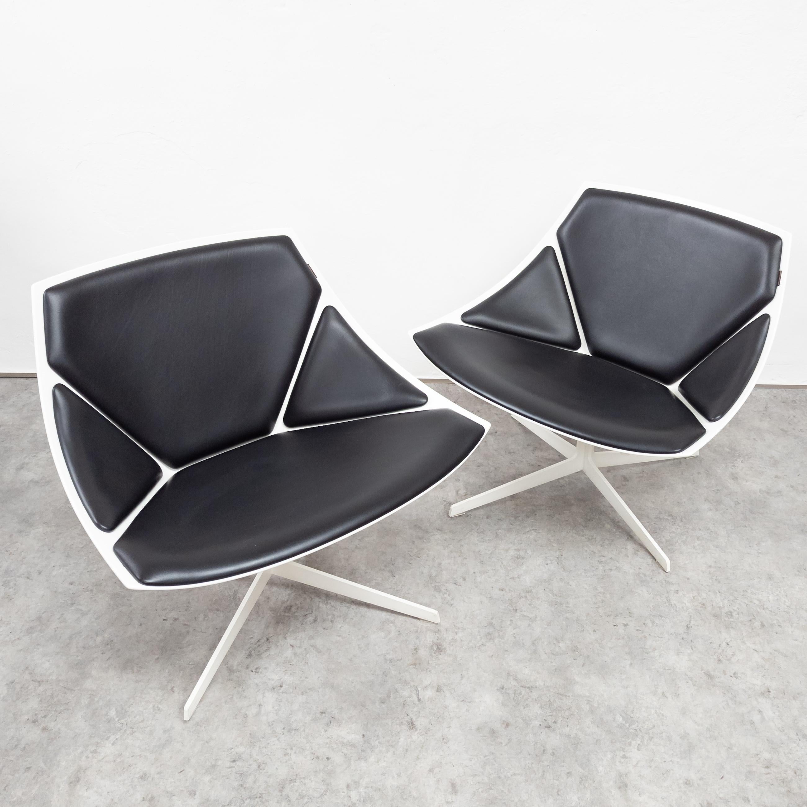 Designed in Space age style in 2007, manufactured by Danish company Republic of Fritz Hansen. Shell is made of injection-molded fiber-reinforced lacquered plastic with leather upholstery. Swivel base is made of lacquered steel with transparent leg