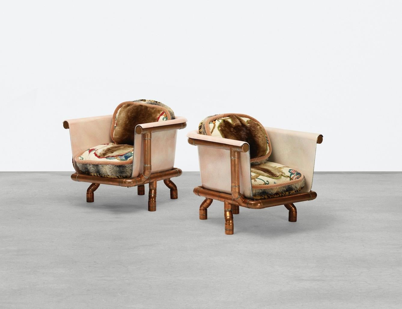 Unique set of Joel Otterson armchairs. Constructed of enameled cast iron, copper pipes, upholstery, animal hide, appropriated elements, 1993. One pair (2 total) available.