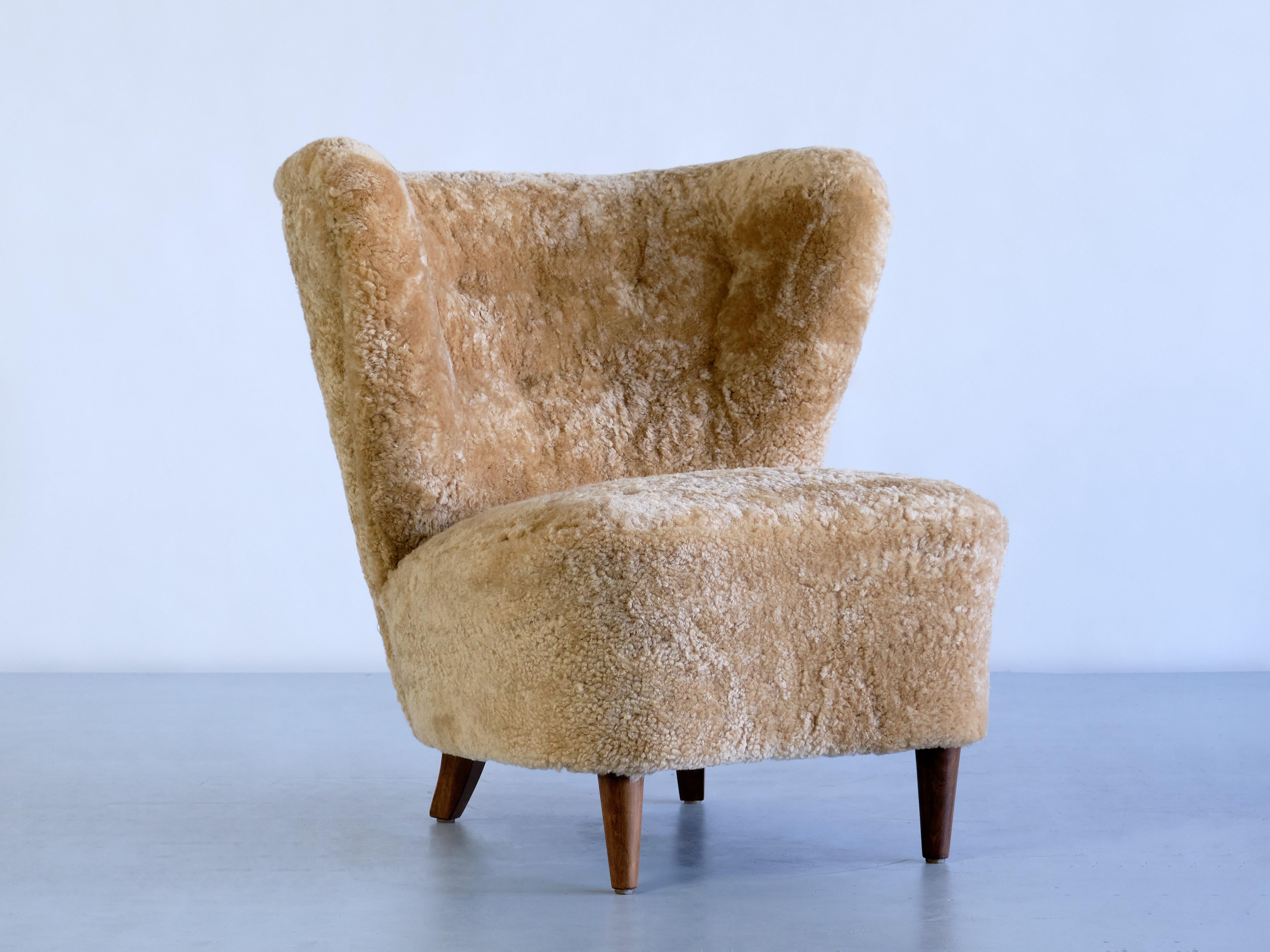 Swedish Pair of Johannes Brynte Lounge Chairs in Sheepskin and Ash Wood, Sweden, 1940s For Sale