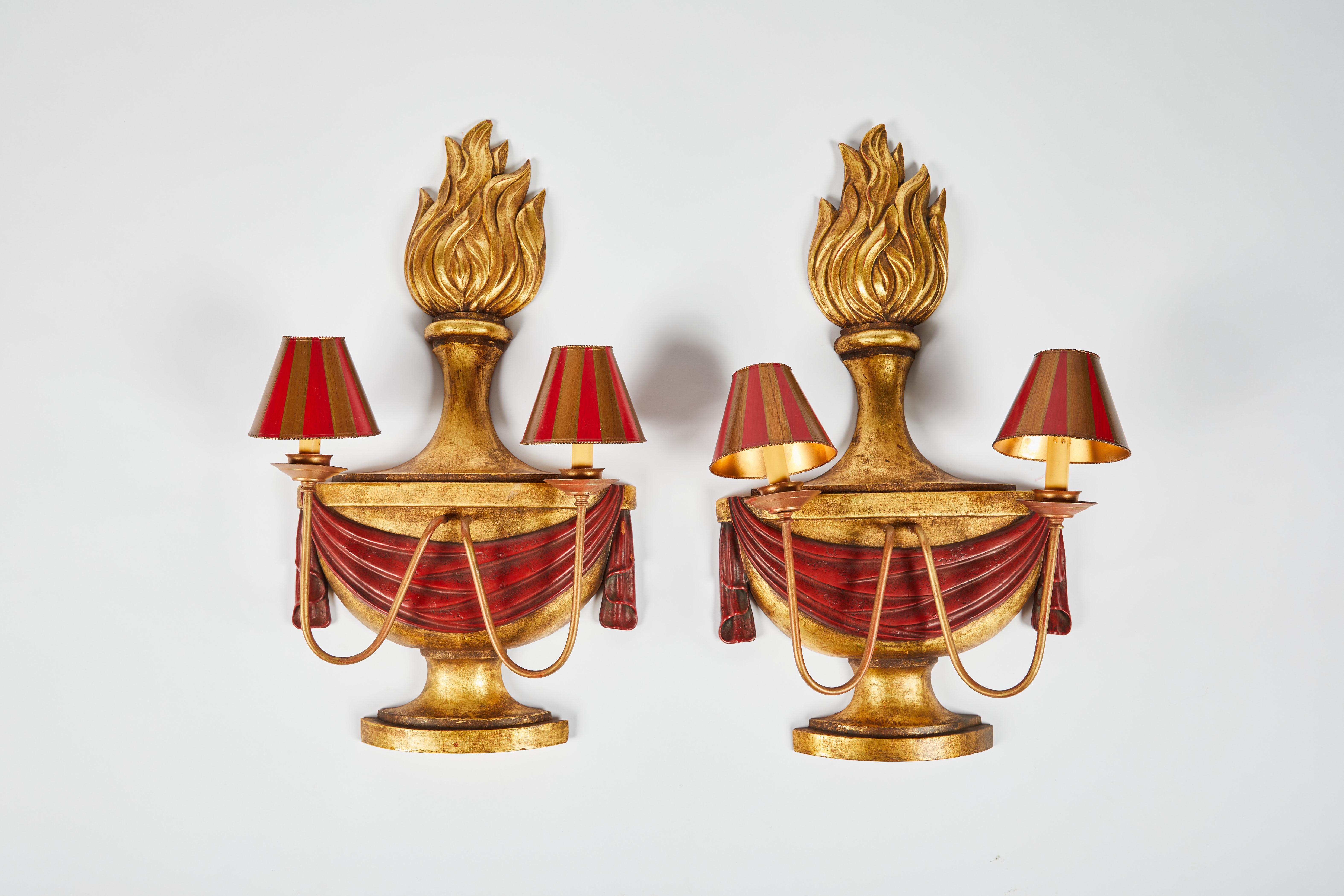 Pair of John Rosselli parcel-gilt and painted wood two-light sconces. 

      