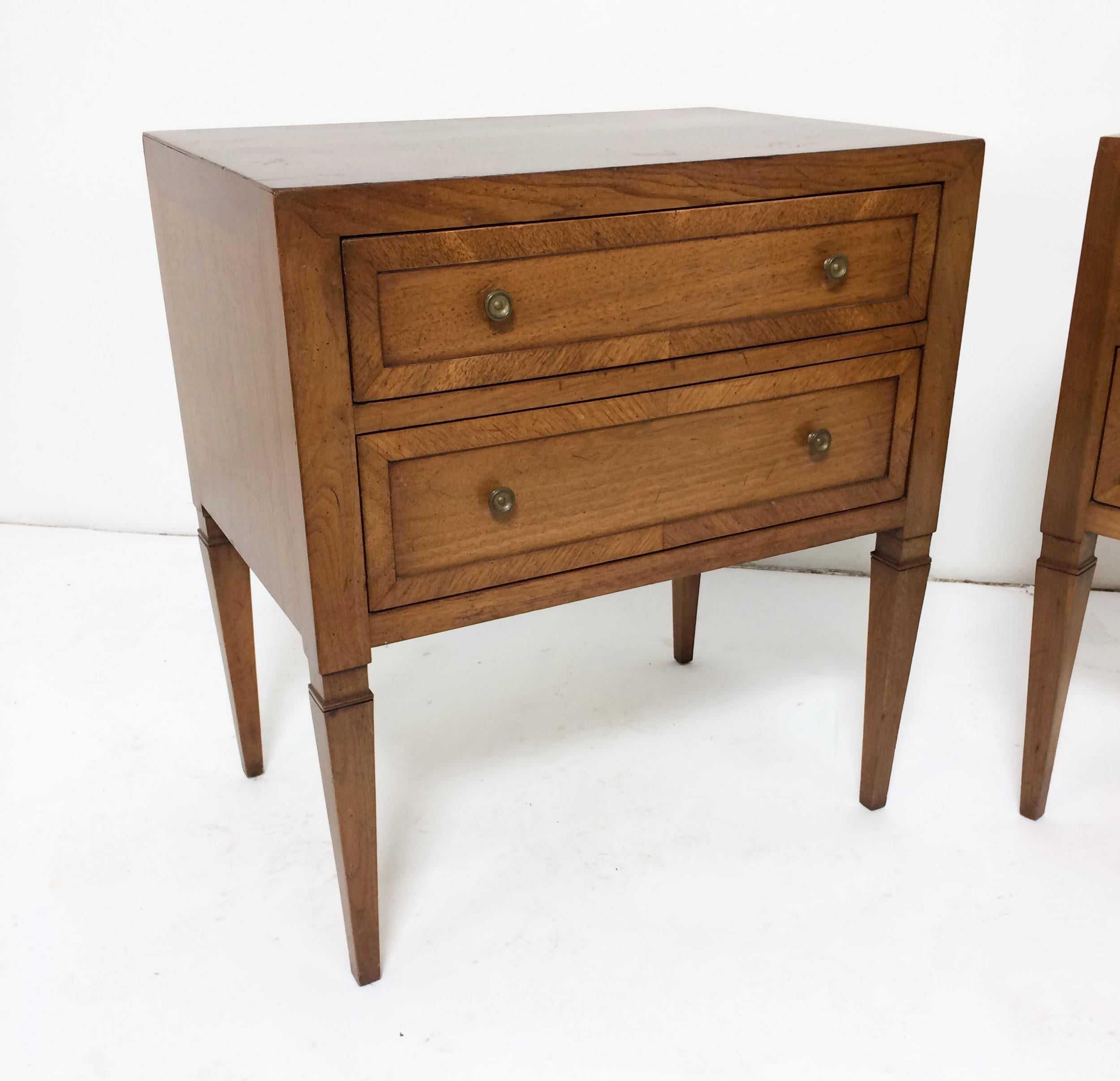 Pair of two-drawer nightstands, a midcentury interpretation of the Classic Federal style, for the Contessa Line by John Stuart, Inc., circa 1960s.