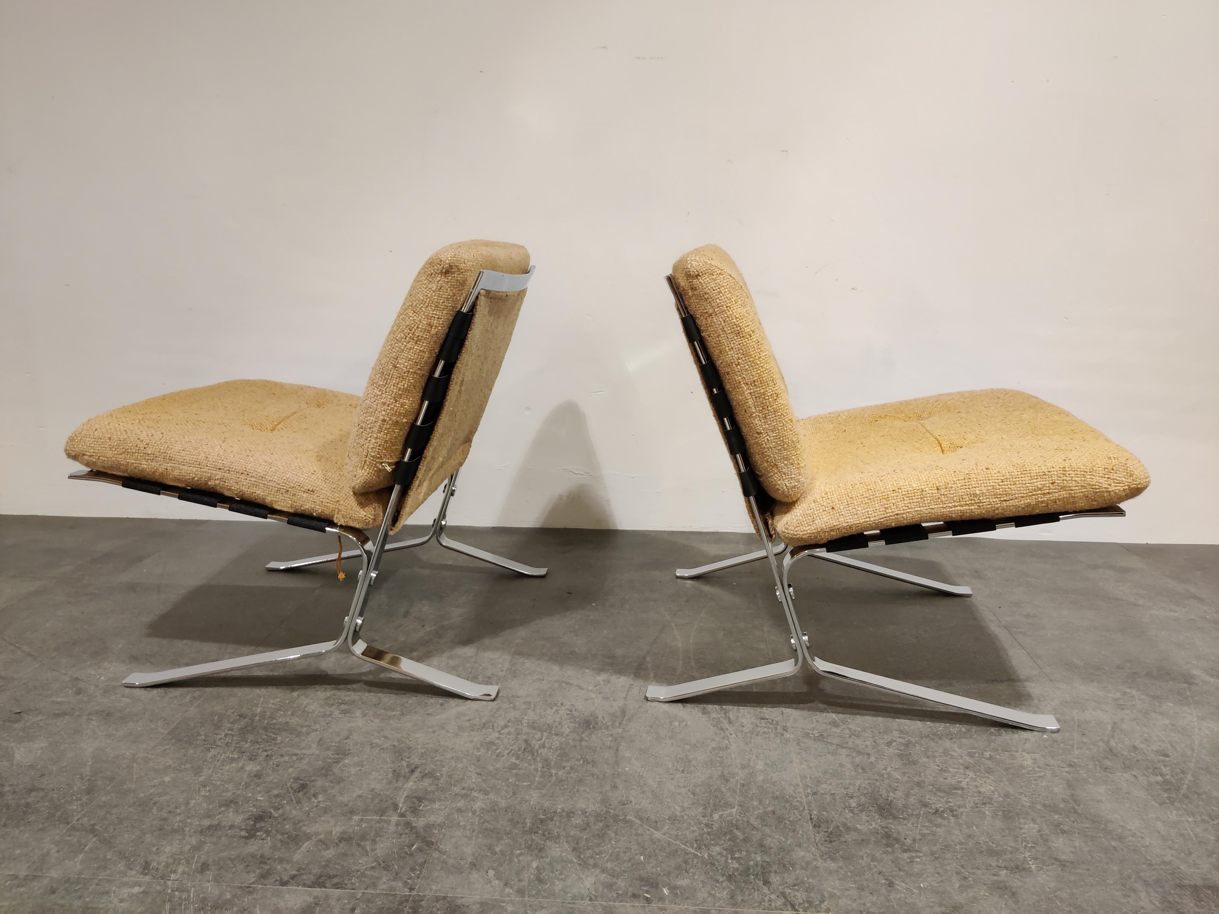 Pair of vintage Joker lounge chairs designed by Olivier Mourgue for Airborne International.

Beautiful, timeless designed chromed steel frames with their original beige fabric upholstery.

1970s - France

Good condition.

Dimensions
Height: