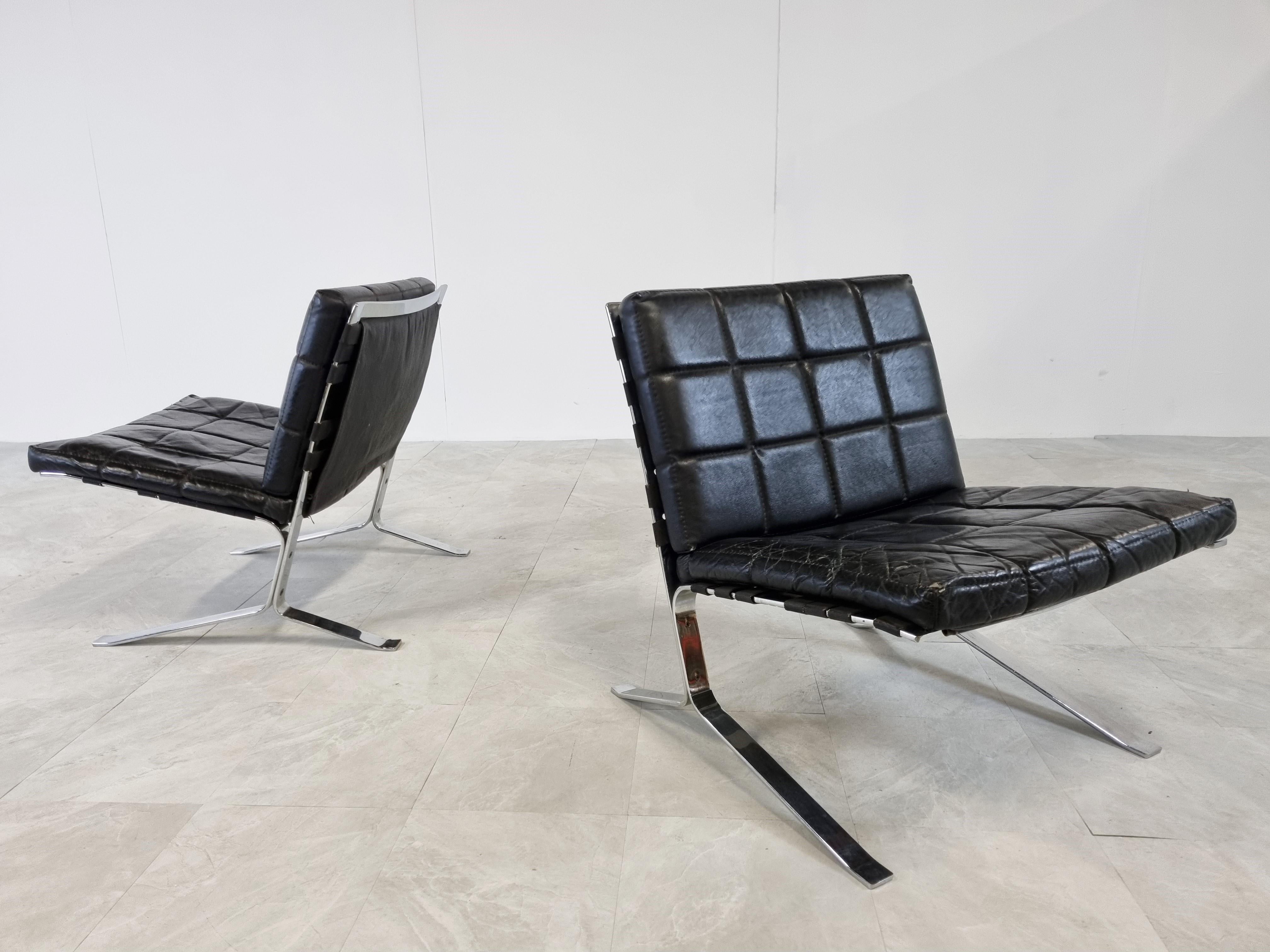 Pair of vintage Joker lounge chairs designed by Olivier Mourgue for Airborne International.

Beautiful, timeless designed chromed steel frames with their original black leather upholstery.

1970s - France

Condition: Overall good condition,