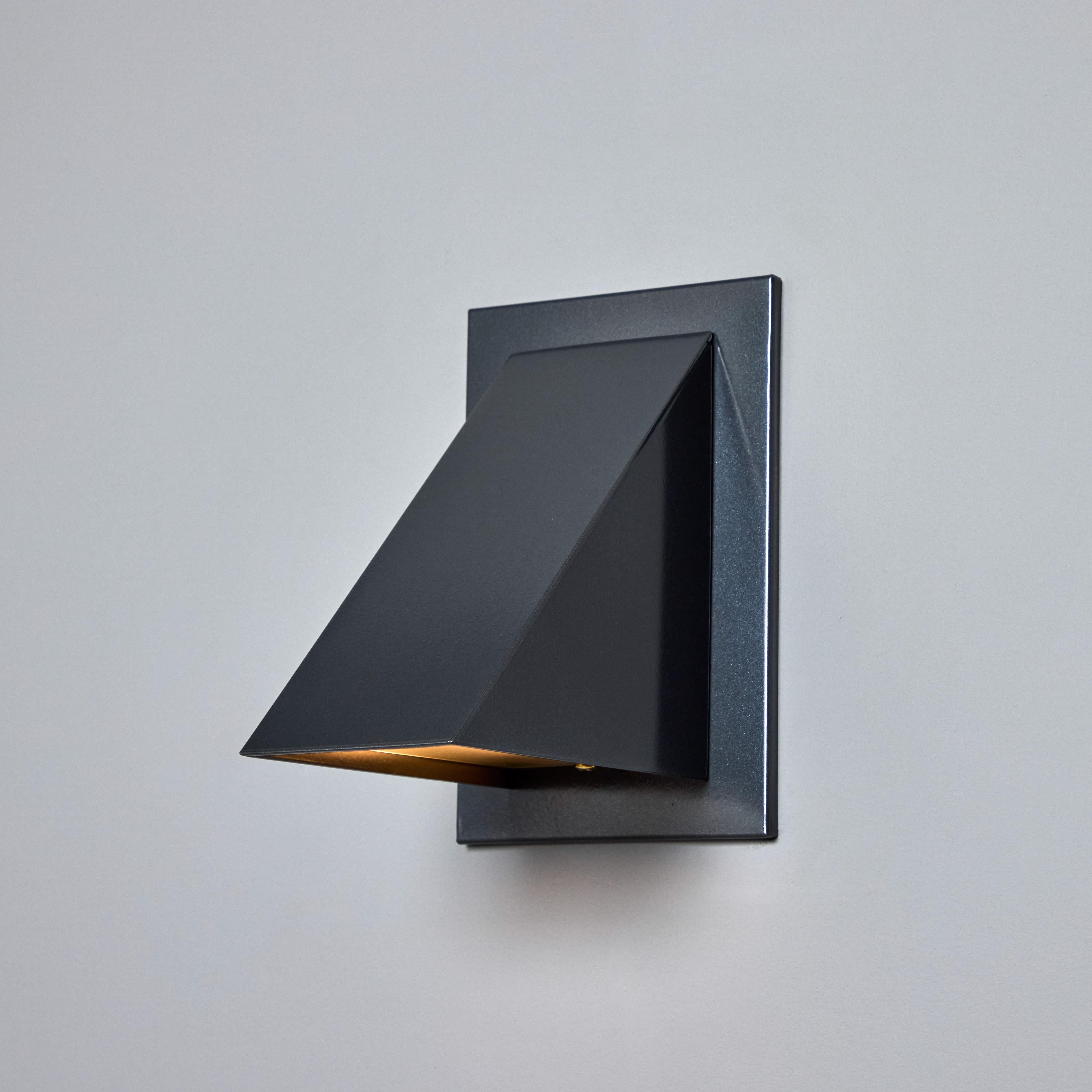Pair of Jonas Bohlin 'Oxid' Wall Lights for Örsjö in Painted Steel 

Executed in steel painted metal with an opaline glass diffuser. An incredibly refined and clean geometric design that is quintessentially Scandinavian. UL listed for indoor or