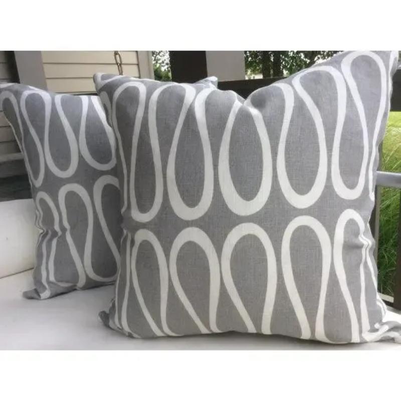 Fabulous Jonathan Adler for Kravet Bodoni linen in grey and cream. Bodoni features a simple geometric loop in cream on a wonderful linen background in grey. Pillow covers are further enhanced by coordinatinng ljnen backing and invisible zipper