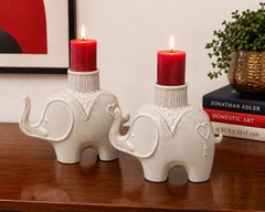 Coppia di portacandele a forma di elefante in ceramica della linea Jonathan Adler per PartyLite, intorno agli anni 2000