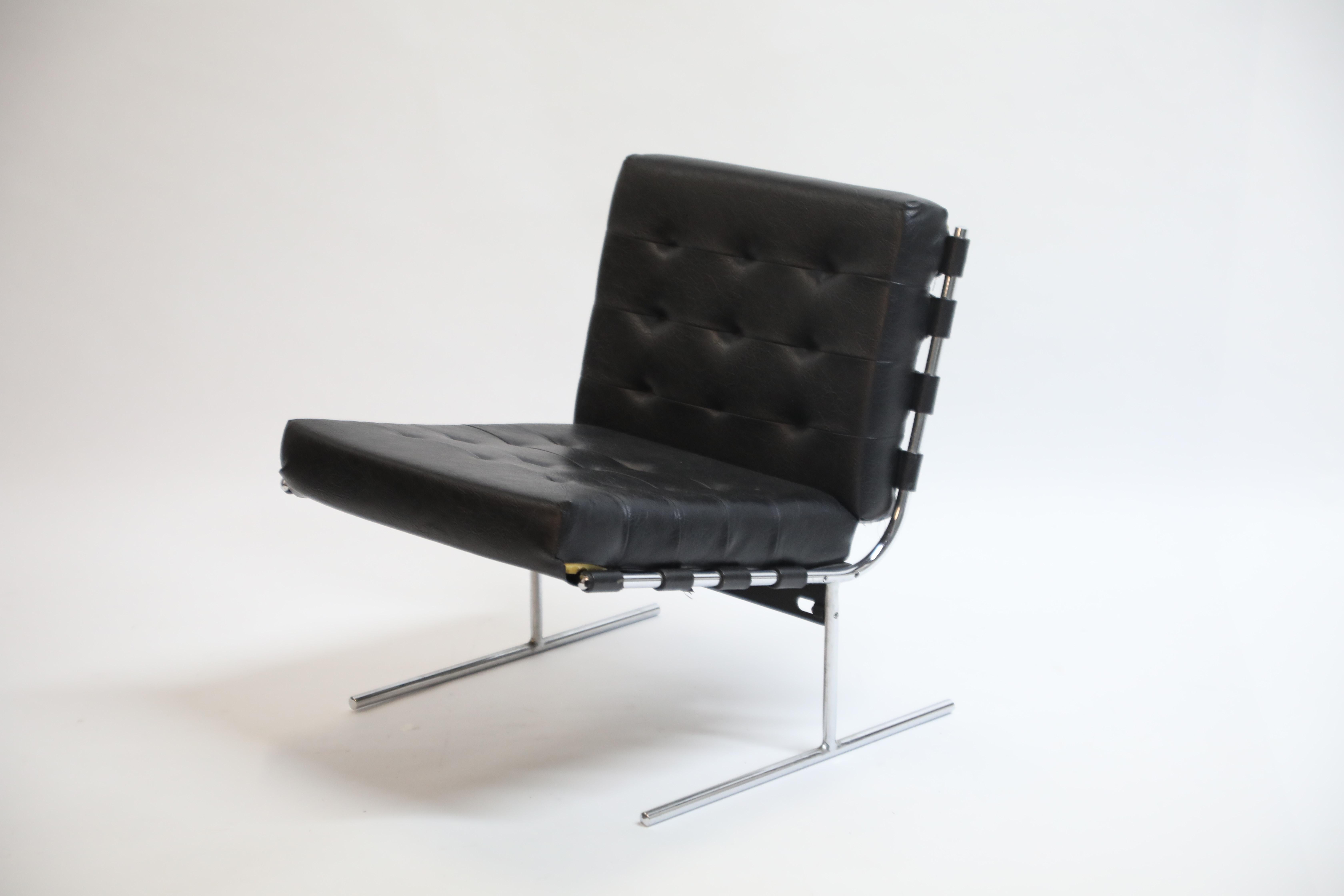 Newly imported from Rio de Janeiro, Brazil, this rarely available pair of T-chairs by Jorge Zalszupin and manufactured by L'Atalier encapsulates the quality and innovation of his designs. Comprised of a sleek chrome frame that has a similar base as