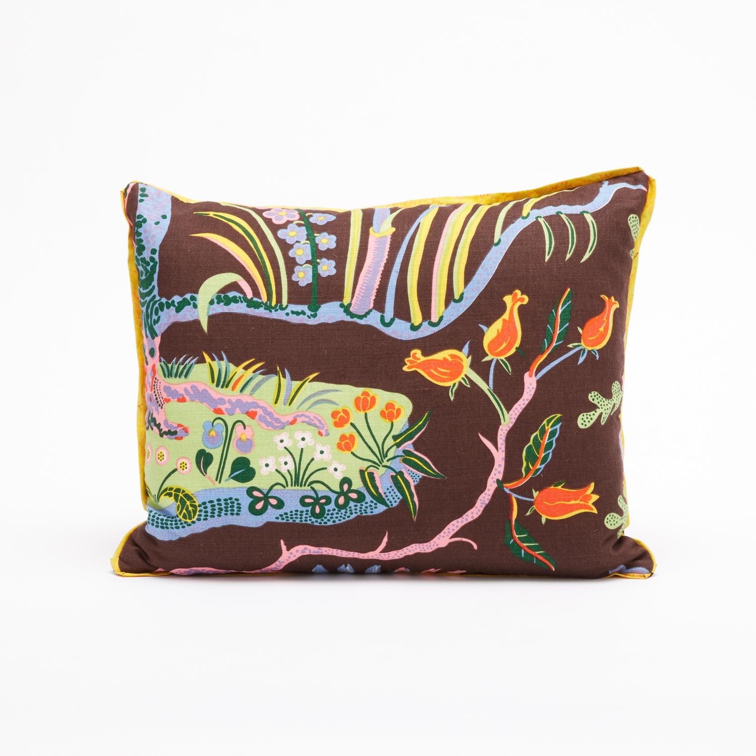 A set of two rectangular cushions featuring vintage fabric by Austrian designer Josef Frank. Each cushion displays a design motif from Josef Frank's 