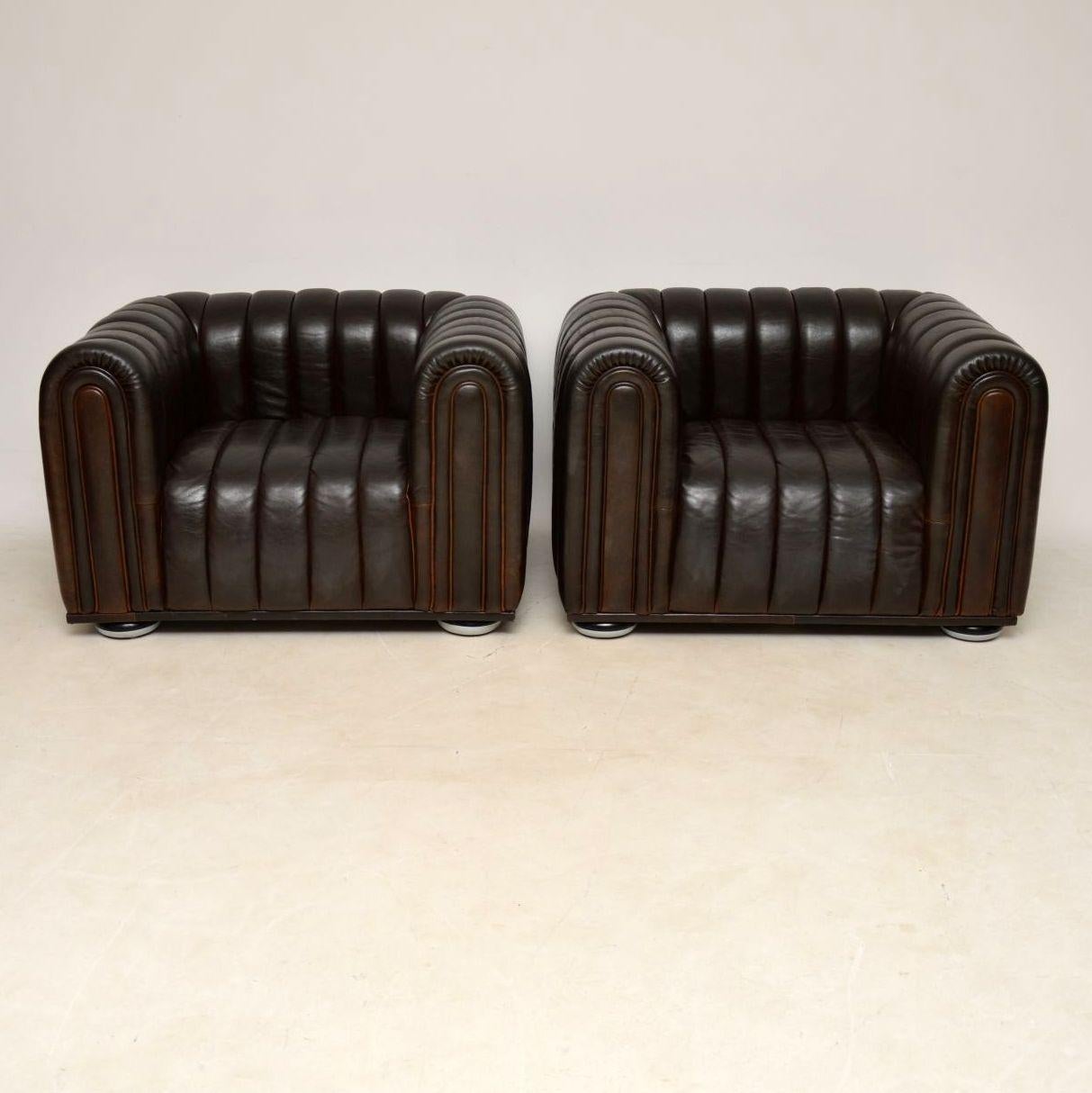 A beautiful and iconic pair of armchairs, these were designed by Josef Hoffman in 1910. This pair in brown leather date from the late 20th century, they are in great condition with only some extremely minor wear here and there, mostly around the top