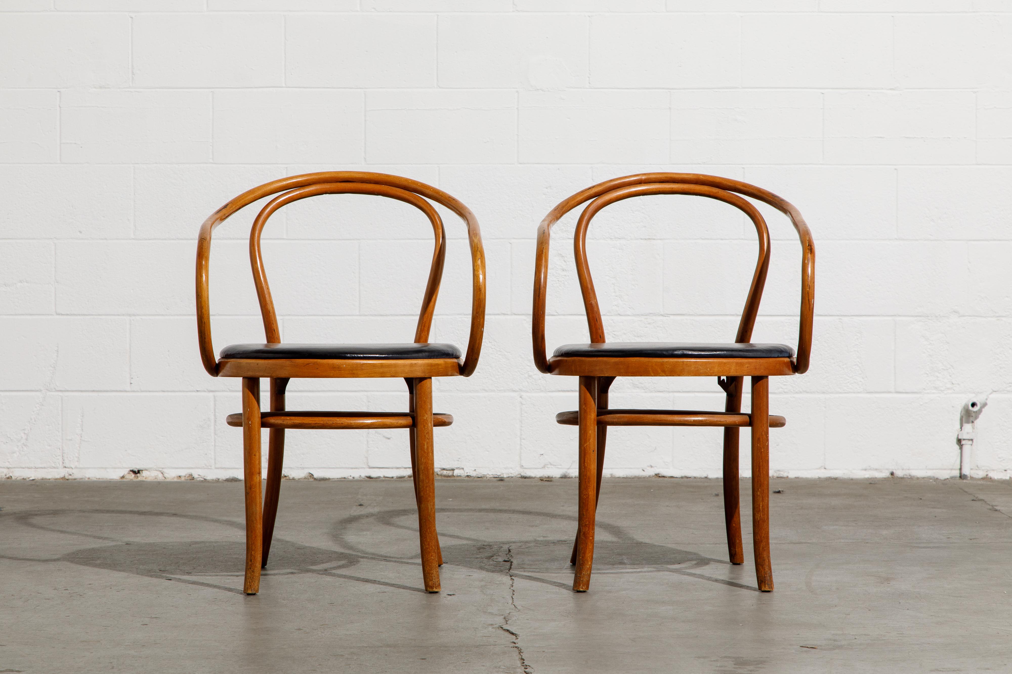 This pair of Josef Hoffmann for Thonet bentwood armchairs are classic collectible pieces of design, signed underneath with original Thonet labels. Priced for the pair in this listing, if you wish to purchase a single chair contact us for more