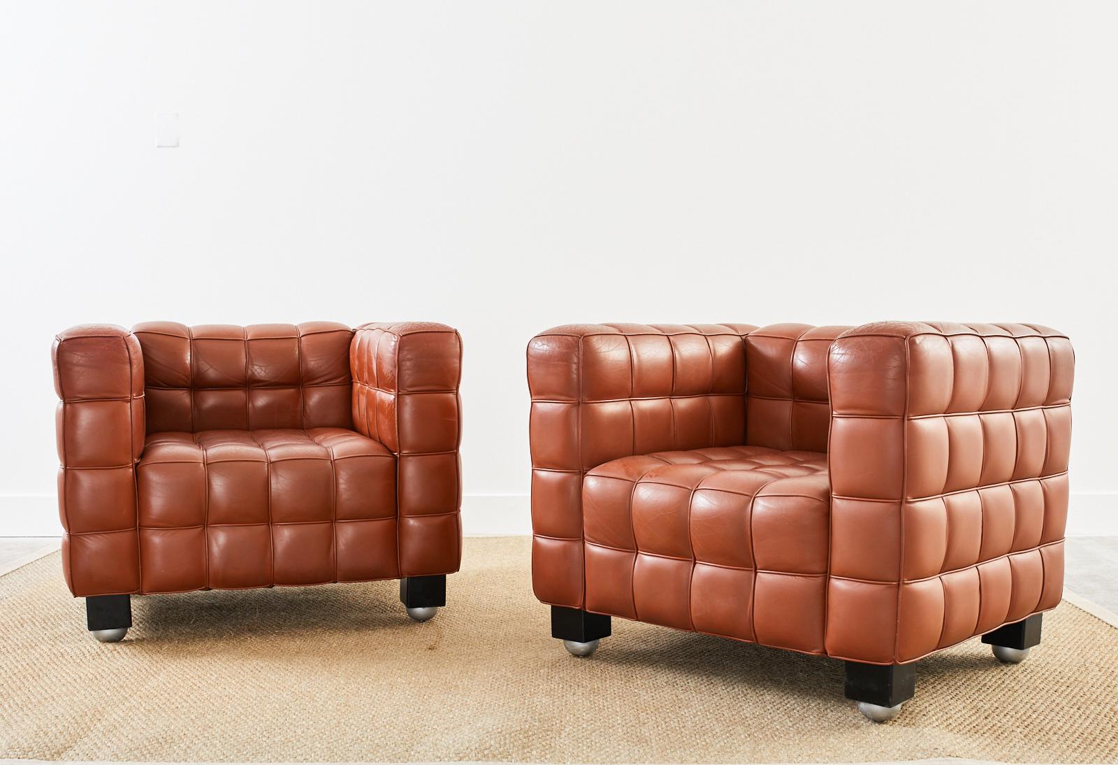 Rare authentic pair of labeled leather Kubus armchairs or lounge chairs designed in 1910 by Austrian Vienna secession designer Josef Hoffmann (1870-1956 Austrian). Manufactured by Wittmann in Vienna, Austria late 20th century. Iconic design