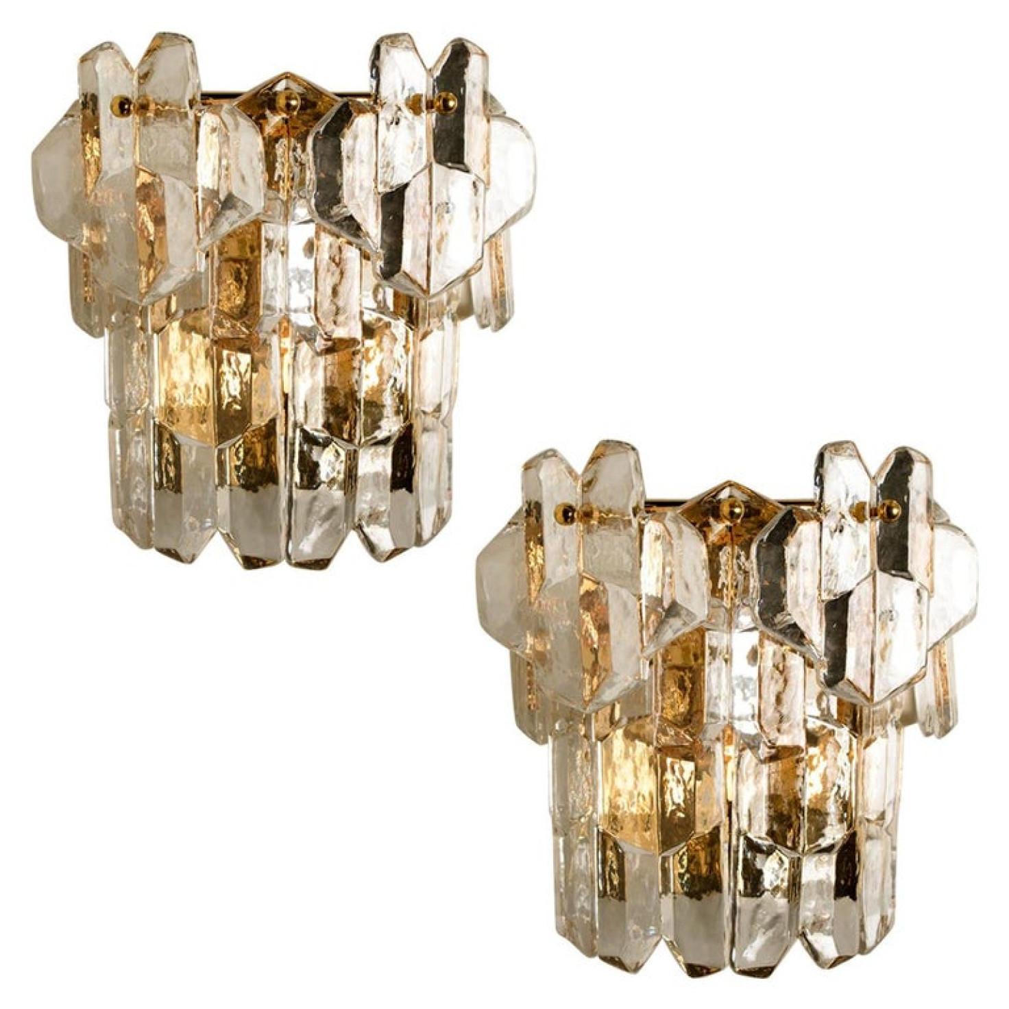 Pair of high-end and handmade brass wall lights made by Kalmar in Austria. This model 