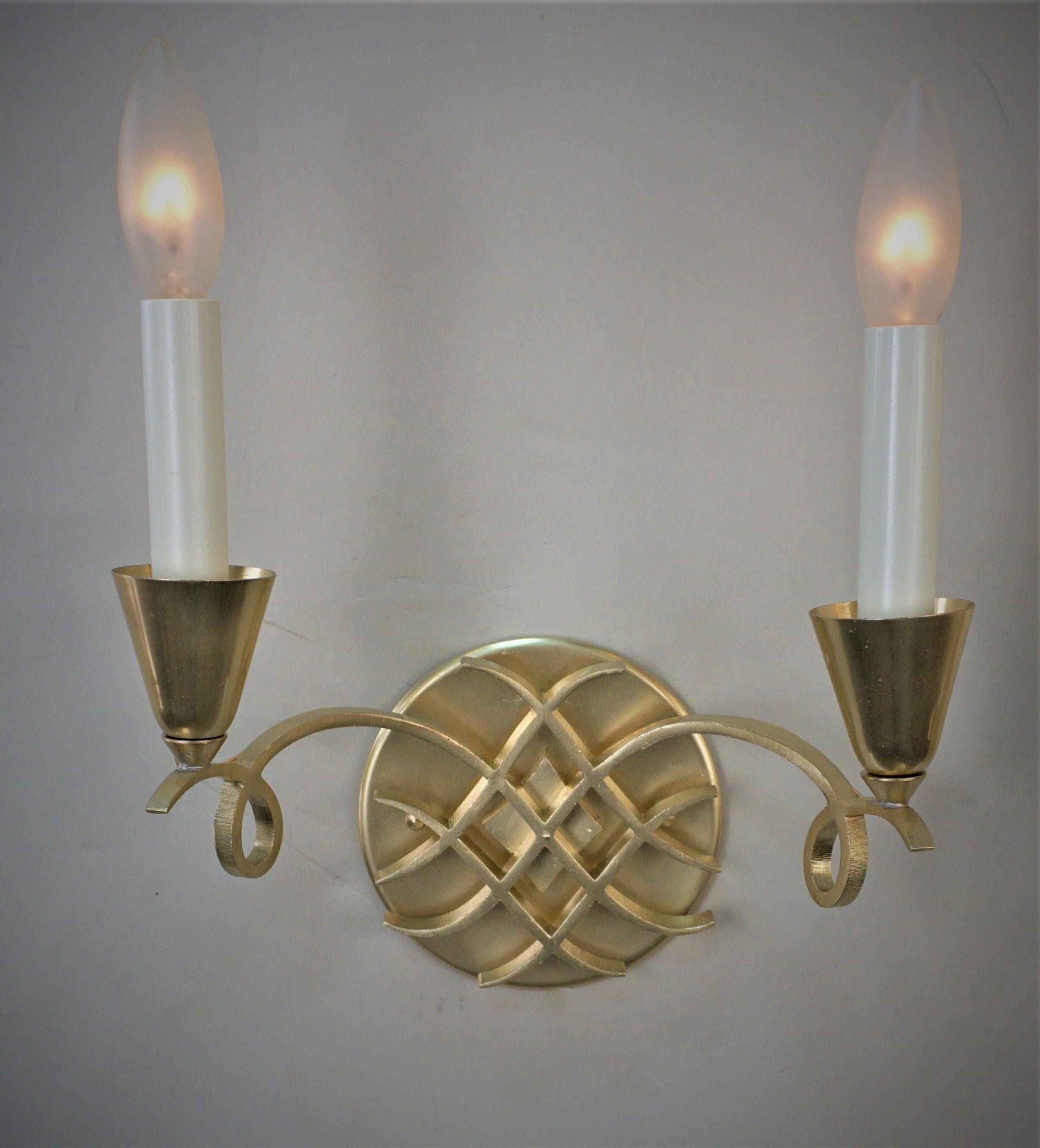Pair of 1950's double arm satin finish bronze wall sconces.
Professionally rewired and ready for installation.