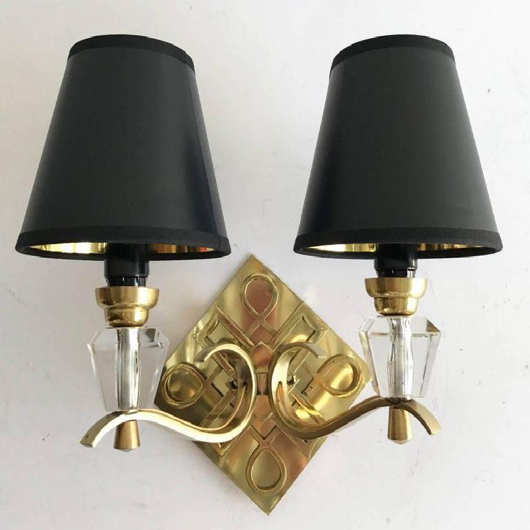 Superb pair of Jules Leleu styles two arms sconces. US rewired and in working condition two light, 60 watts max bulb backplate, dimension 4 by 4.
 