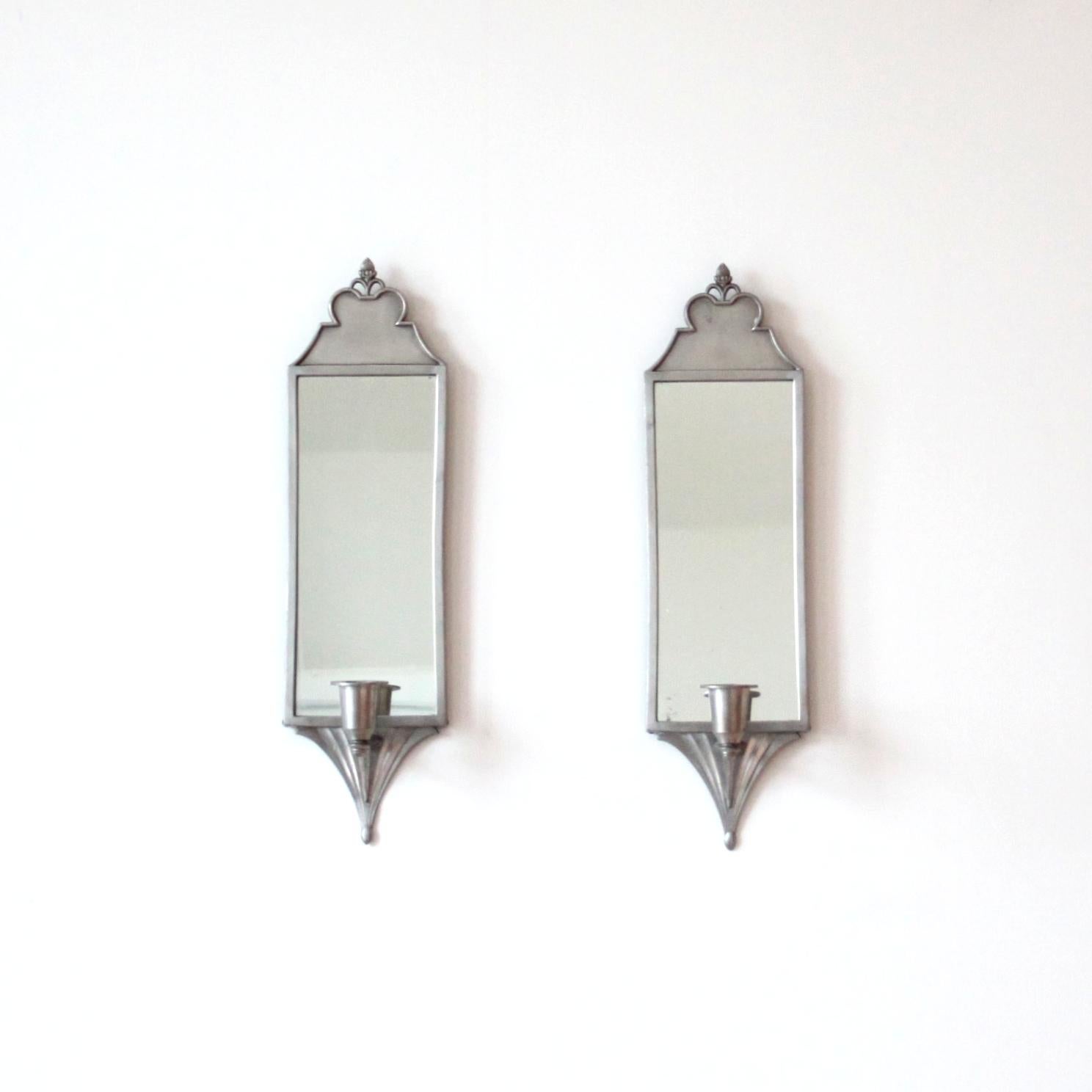 JUST ANDERSEN 

A beautiful pair of candle sconces by Just Andersen in matte pewter. 

This is one of his very early works - Dessin 120 - production 1918-1928. 

Each sconce stamped Just Danmark MT 120.

Very good vintage condition and a beautiful