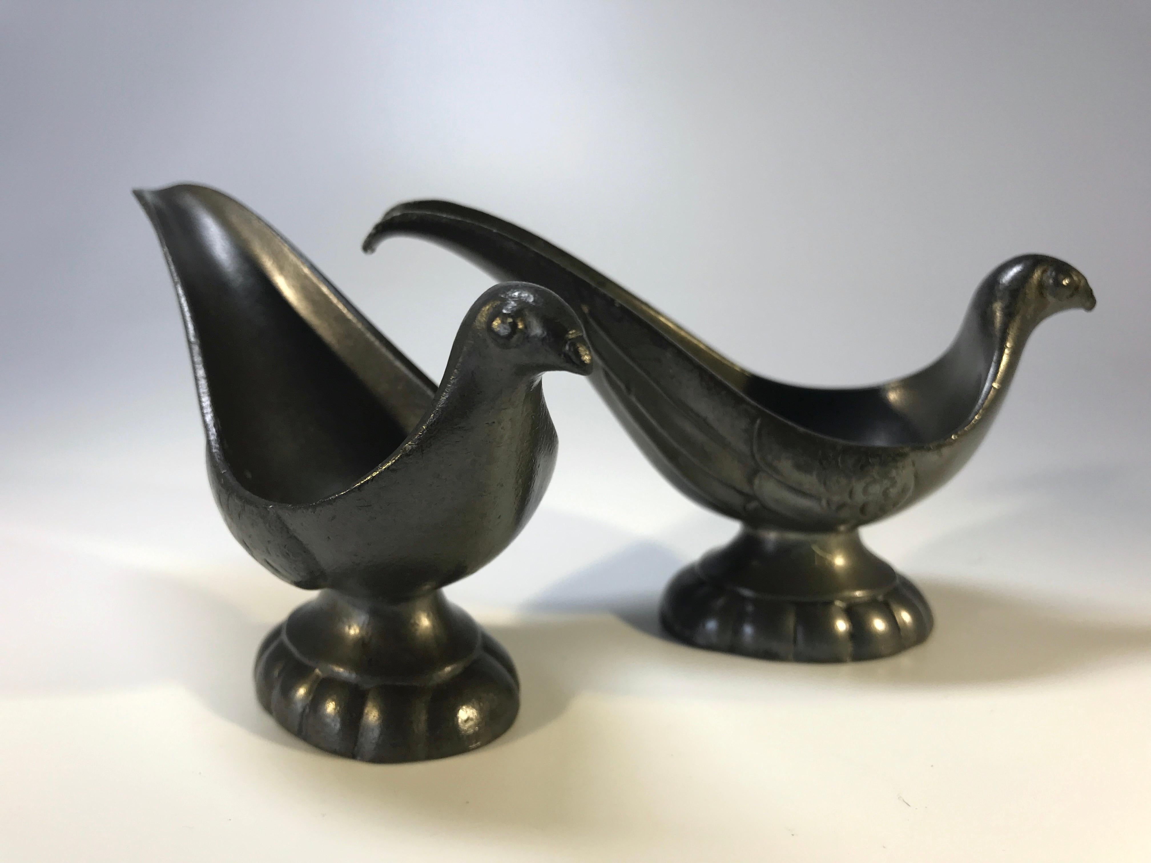 Pair of Just Andersen of Denmark, Pewter stylised bird pipe holders 
Although a pair, they are not identical - each has it's own characteristics
Circa 1930's
Stamped on each base
Measures: Height 2.5 inch, width 4.25 inch, depth 1.5 inch
Good