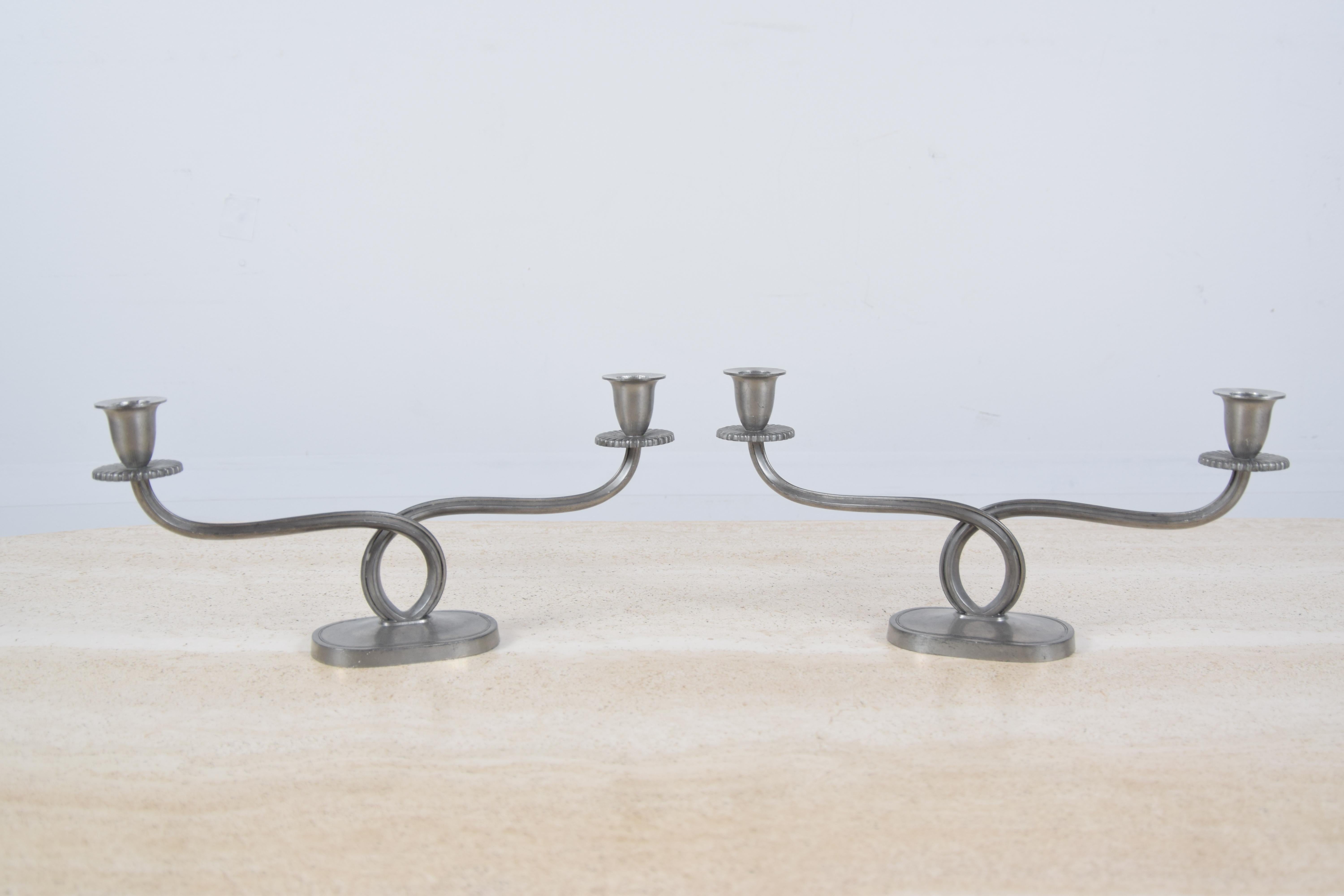 Pair of pewter candlesticks, circa 1955, by Danish Metal-smith Just Andersen. Candlesticks stand 6 1/2