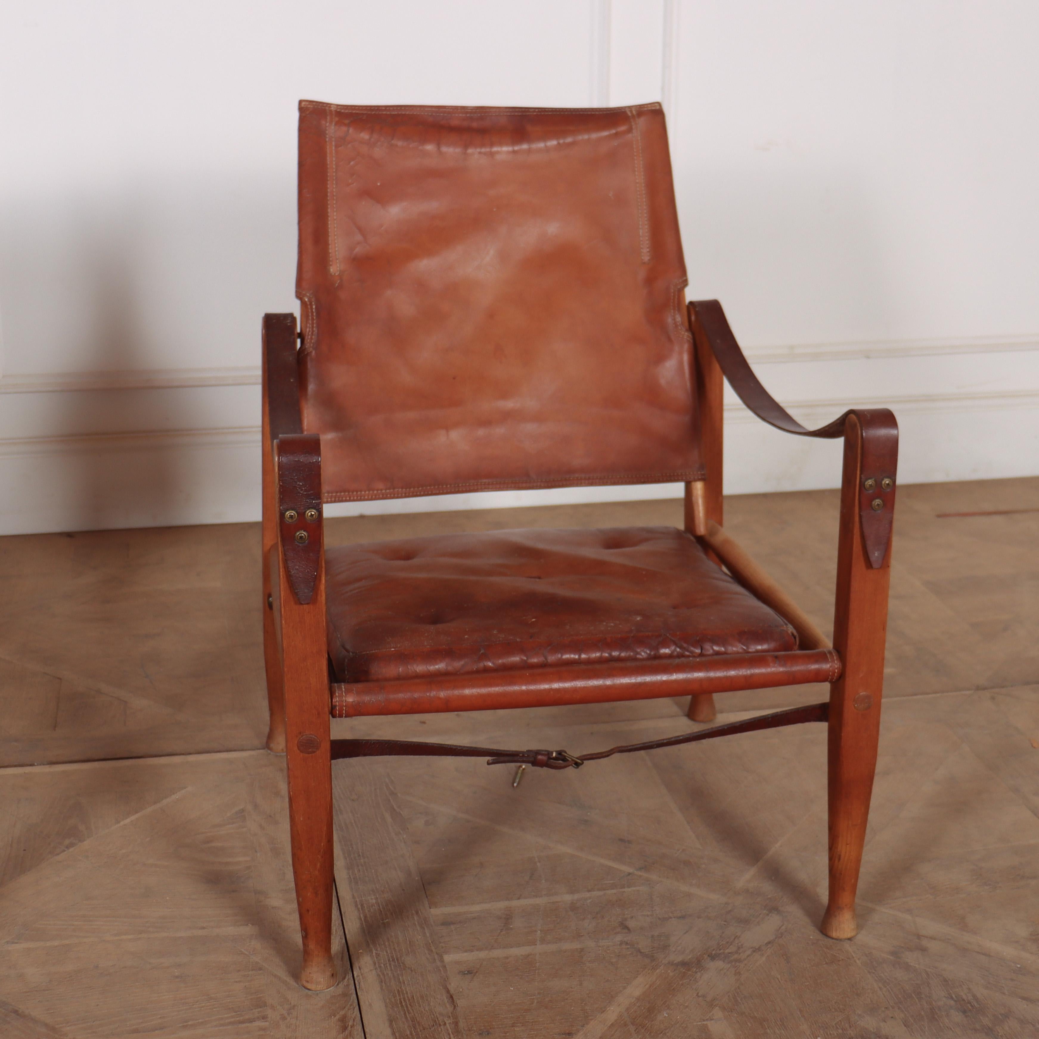 Pair of 20th C Kaare Klint for Rud Rasmussen Swedish leather safari chairs.

Seat height is 12.25