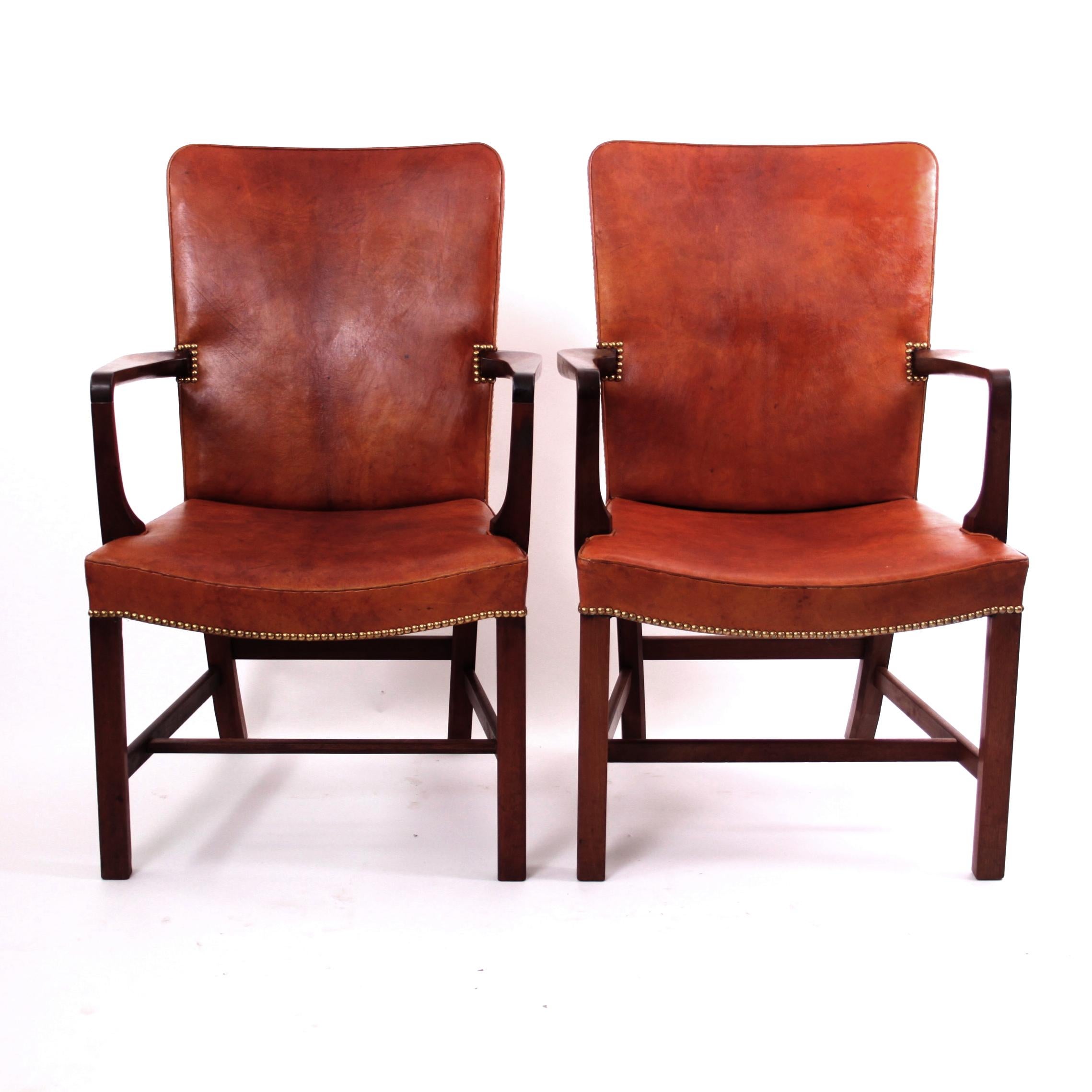 Kaare Klint & Rud Rasmussen, Mid-Century Modern Design

A magnificent pair of Kaare Klint 'Nørrevold' armchairs in patinated Nigerian leather, model no. 5999. This is the largest chair in the series of 