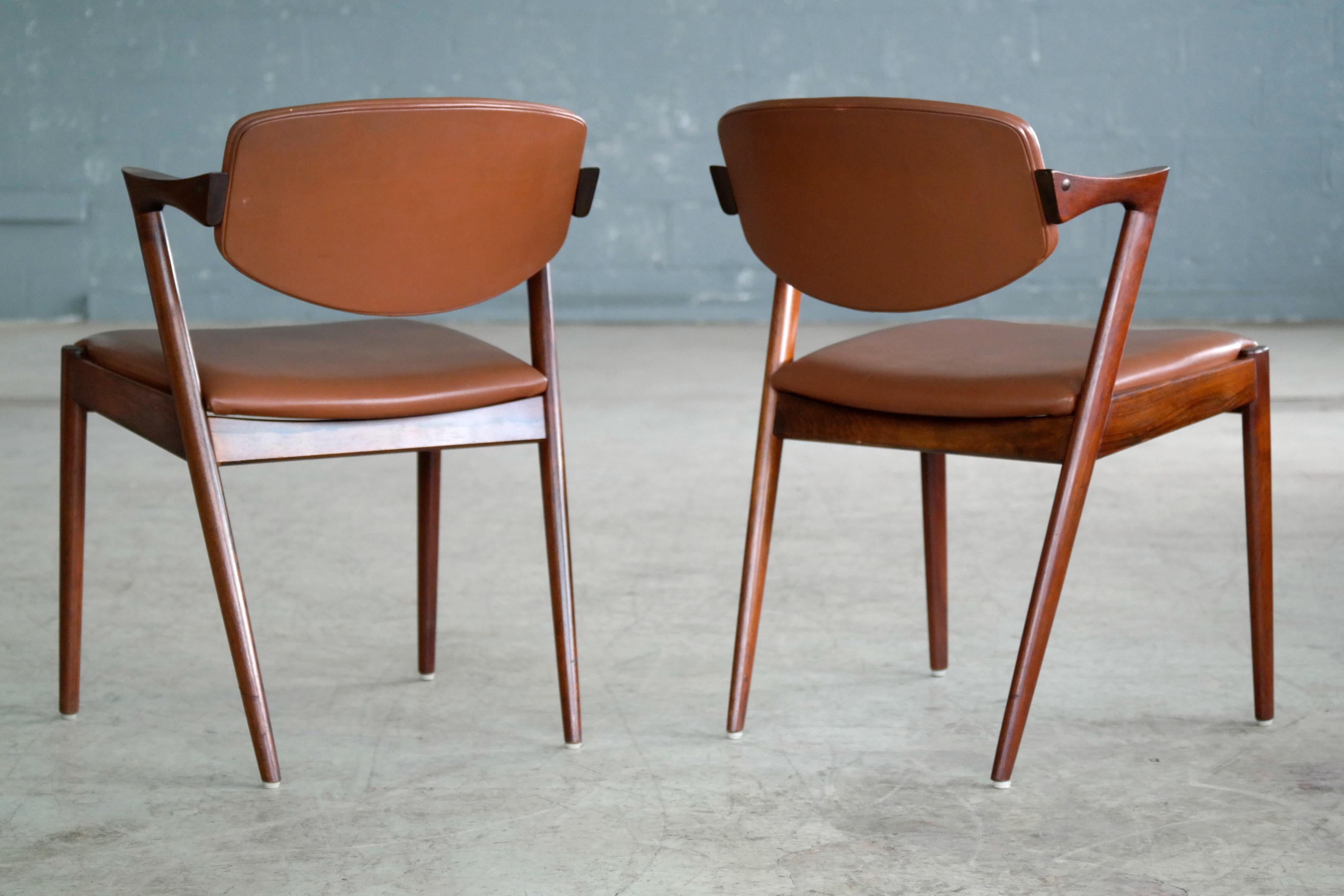 Pair of model #42 dining chairs also known as the 