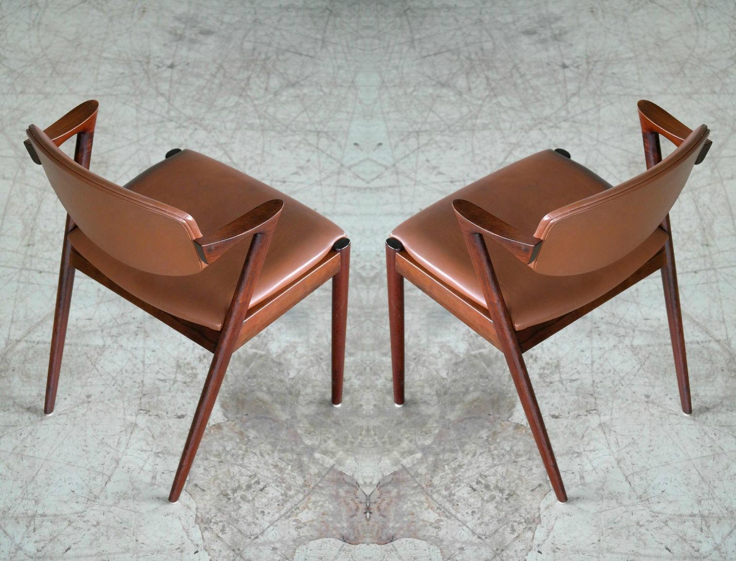 Mid-Century Modern Pair of Kai Kristiansen Model 42 Rosewood Dining Chairs and Brown Leather