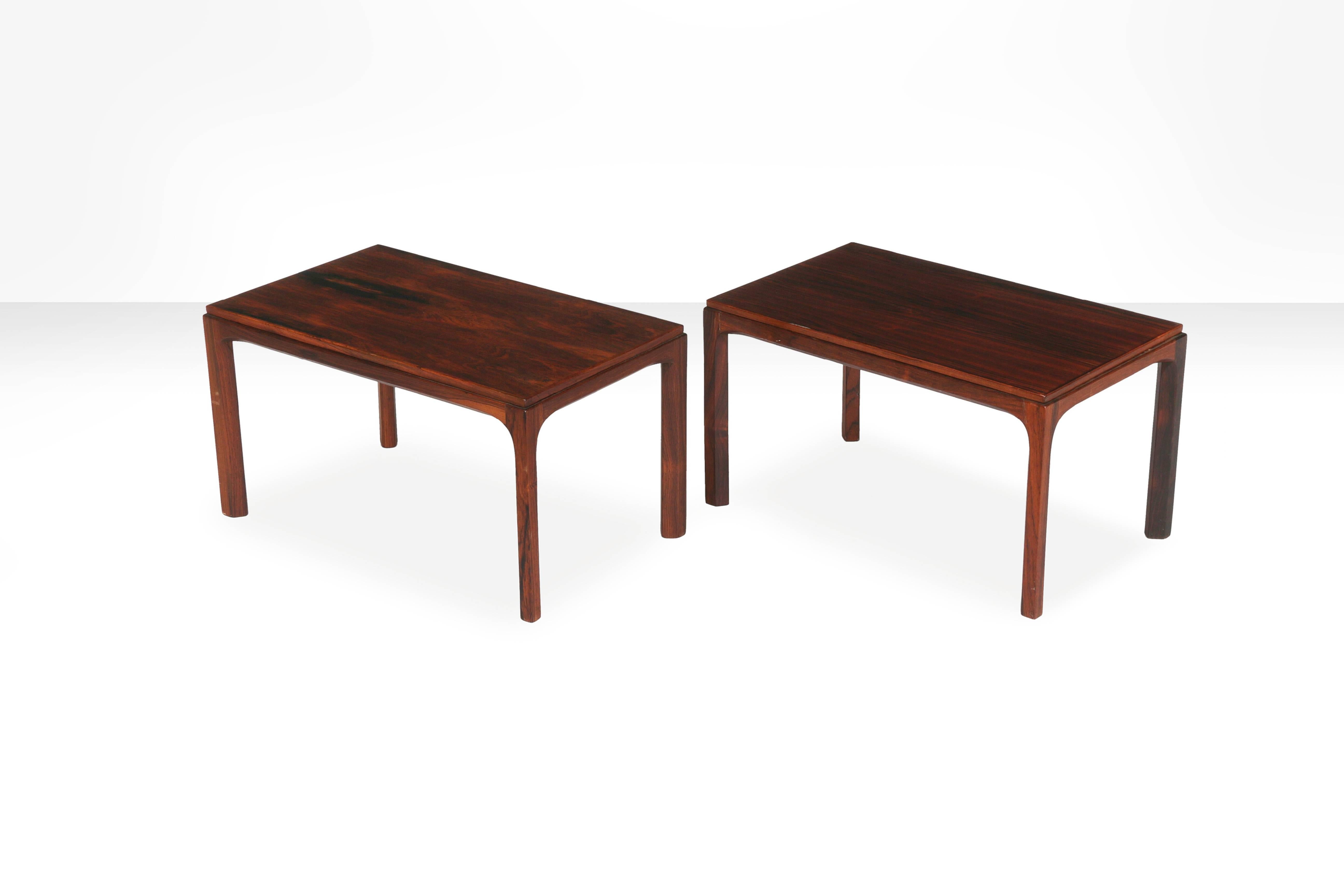 Kai Kristiansen: A pair of rectangular side tables with profiled legs. Manufactured and stamped by Aksel Kjersgaard

Condition:
Normal patina due to age and use. Some scratches and marks.

WORLDWIDE SHIPPING
We offer tailor made solutions for the