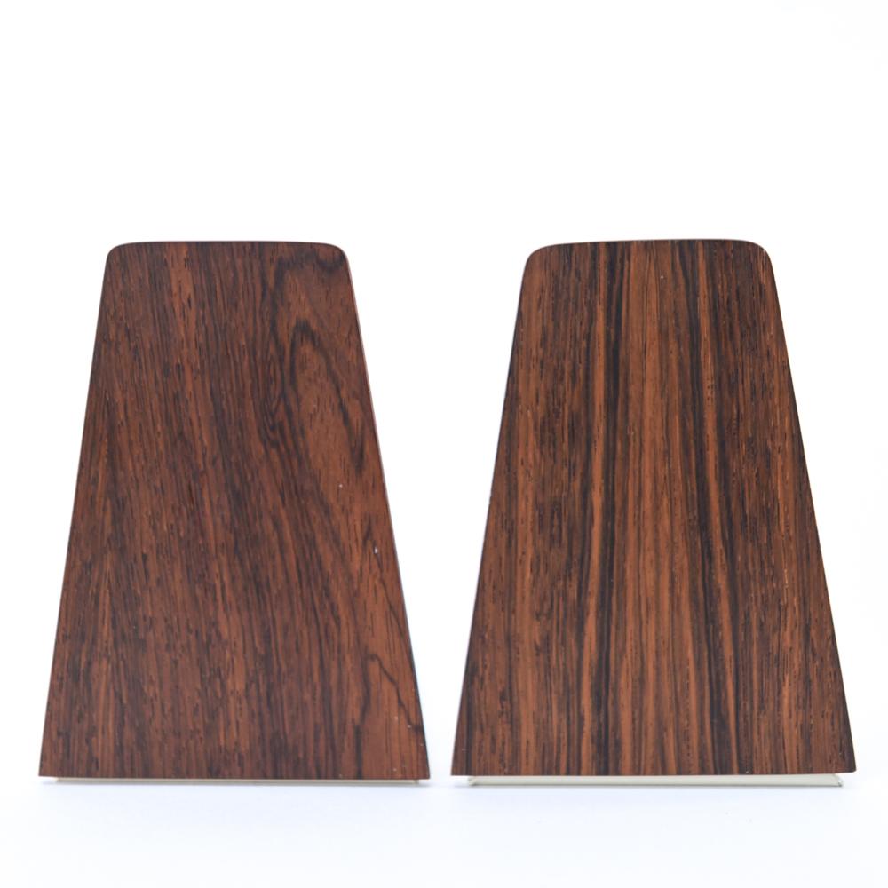 A pair of Danish midcentury teak bookends by the esteemed designer Kai Kristiansen. These bookends are a wonderful accessory to bring in a Scandinavian modern element. Multiple pairs available.