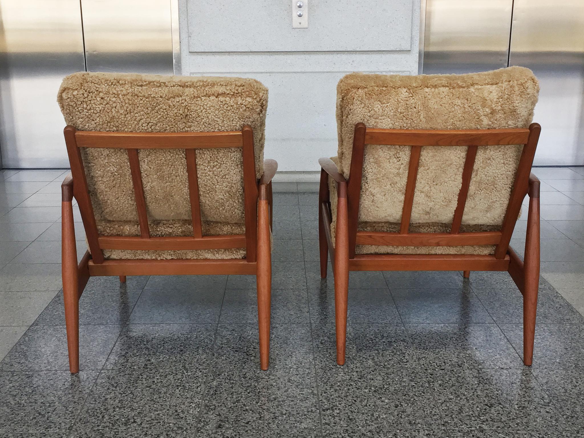 Mid-20th Century Pair of Kai Kristiansen Teak Easy Chairs with Custom Shearling Upholstery