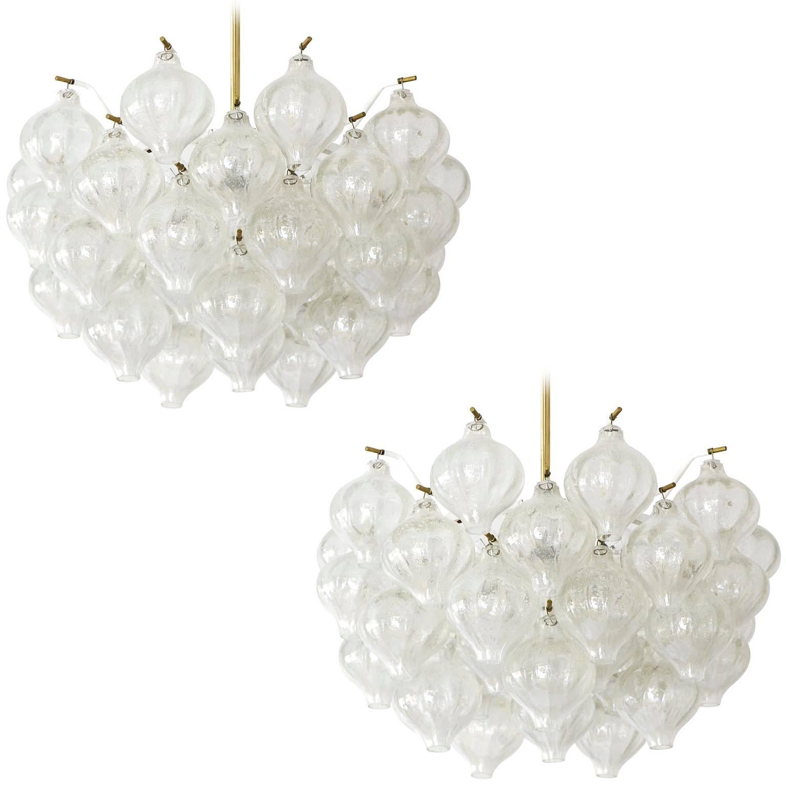 A set of three fantastic light fixtures model Tulipan by J.T. Kalmar, Vienna, Austria, manufactured in midcentury, circa 1970 (late 1960s-early 1970s).
The name Tulipan derives from the tulip shaped handblown bubble glasses. Each glass is handmade