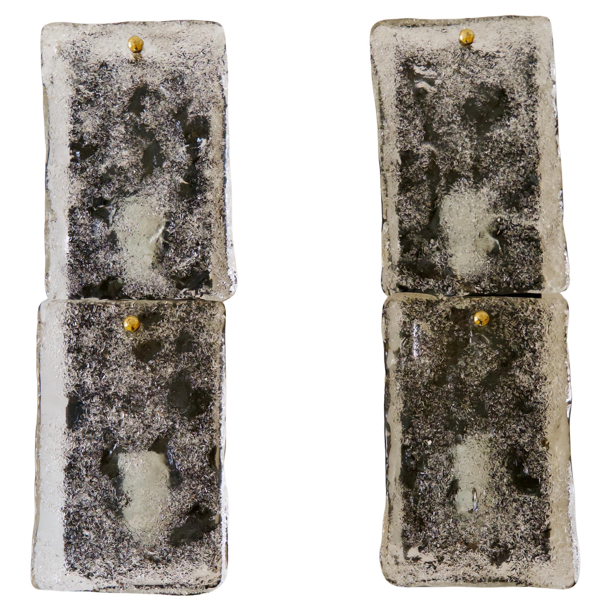 Pair of black metal sconces,  glass shades are resting on the frame held with brass fasteners.
6 pairs available
Holds two candelabra bulb each.