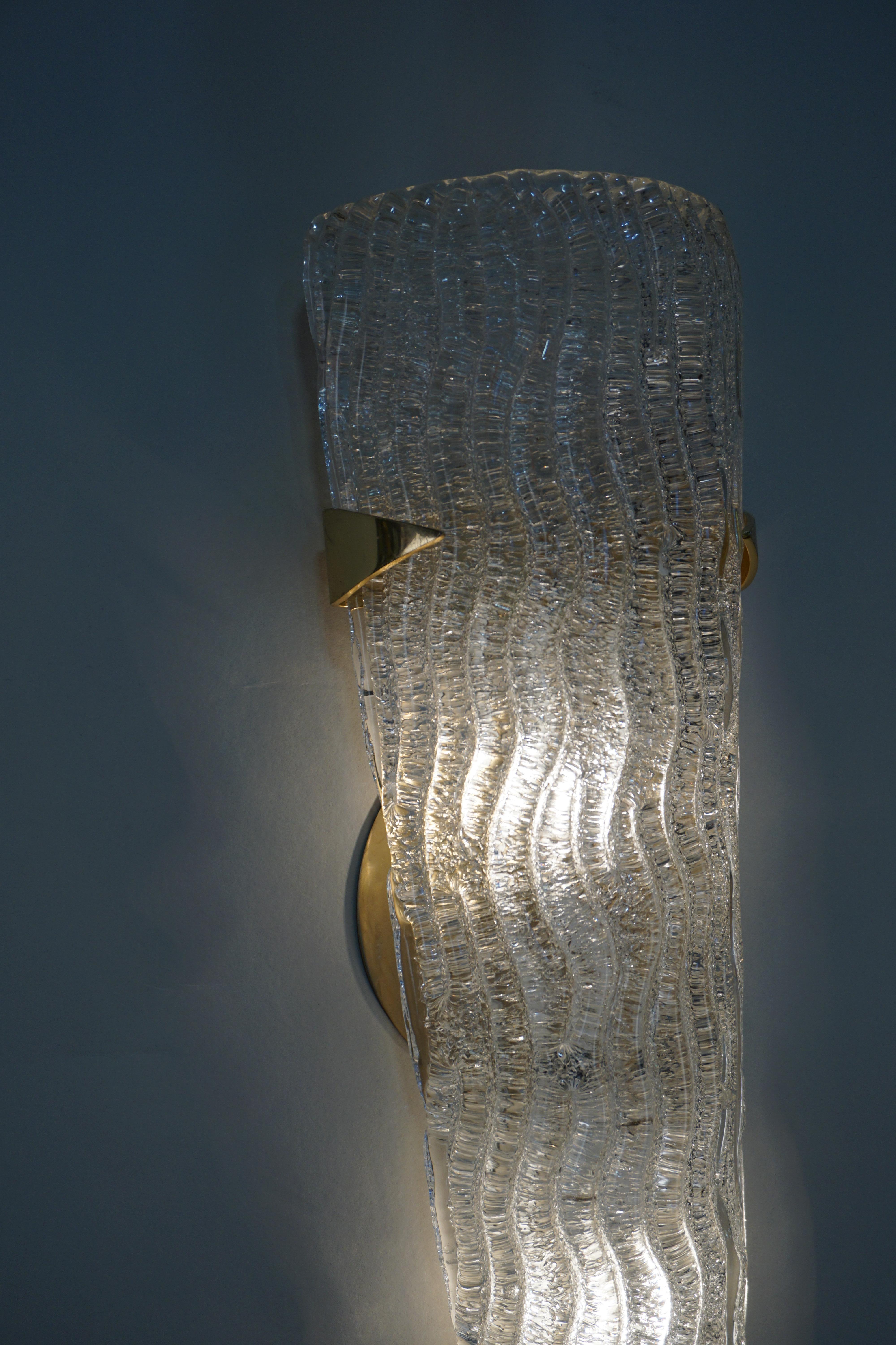 Kalmar 1970s textured glass gold plated fitting hardware double light wall sconces. 
Price is for the pair.
