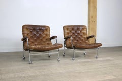 Pair of Karin Lounge Chairs in Tan Leather by Bruno Mathsson for DUX, 1970s