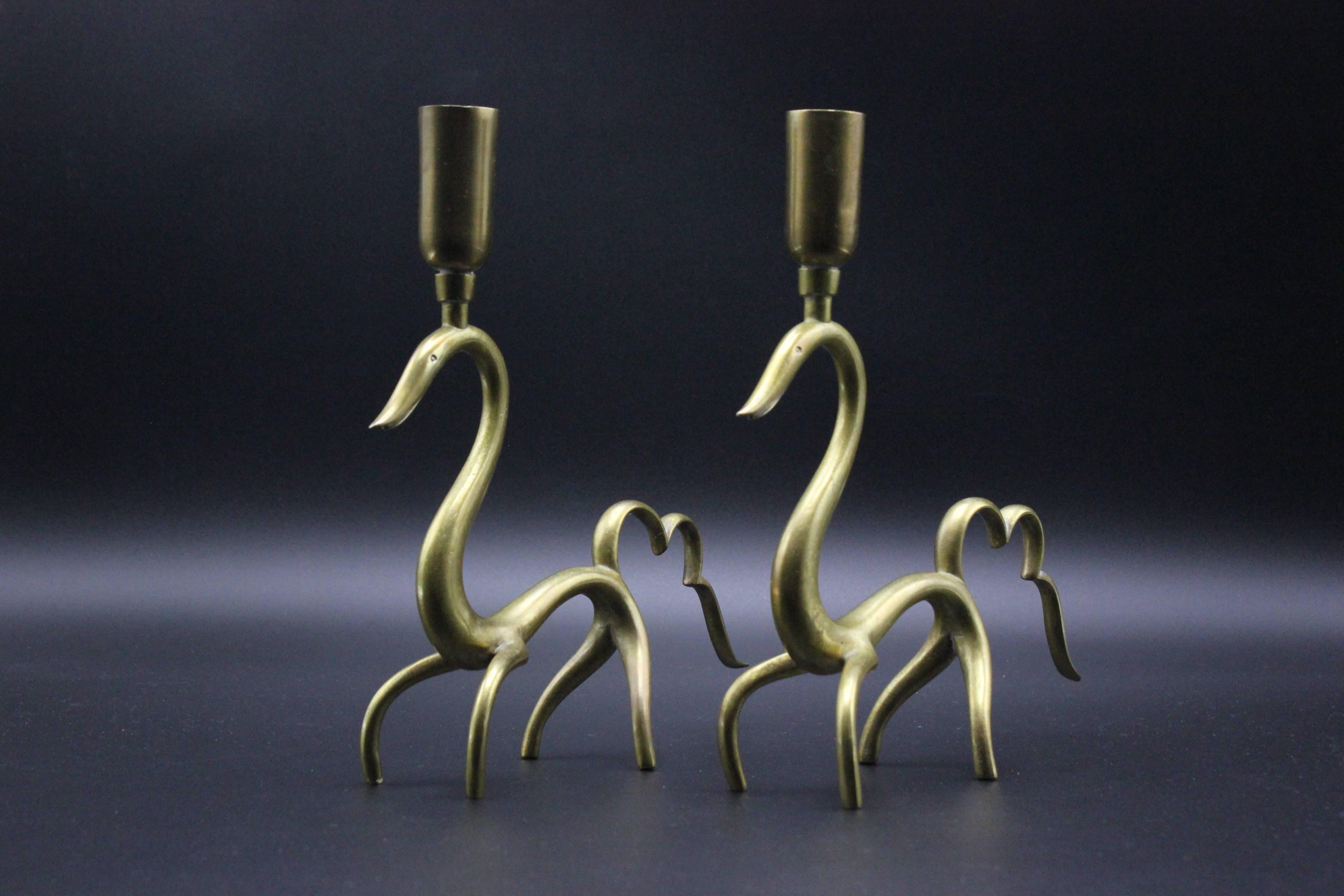 Pair of brass figural candleholders by Karl Hagenauer, circa 1930, Austria. Signed with impressed 