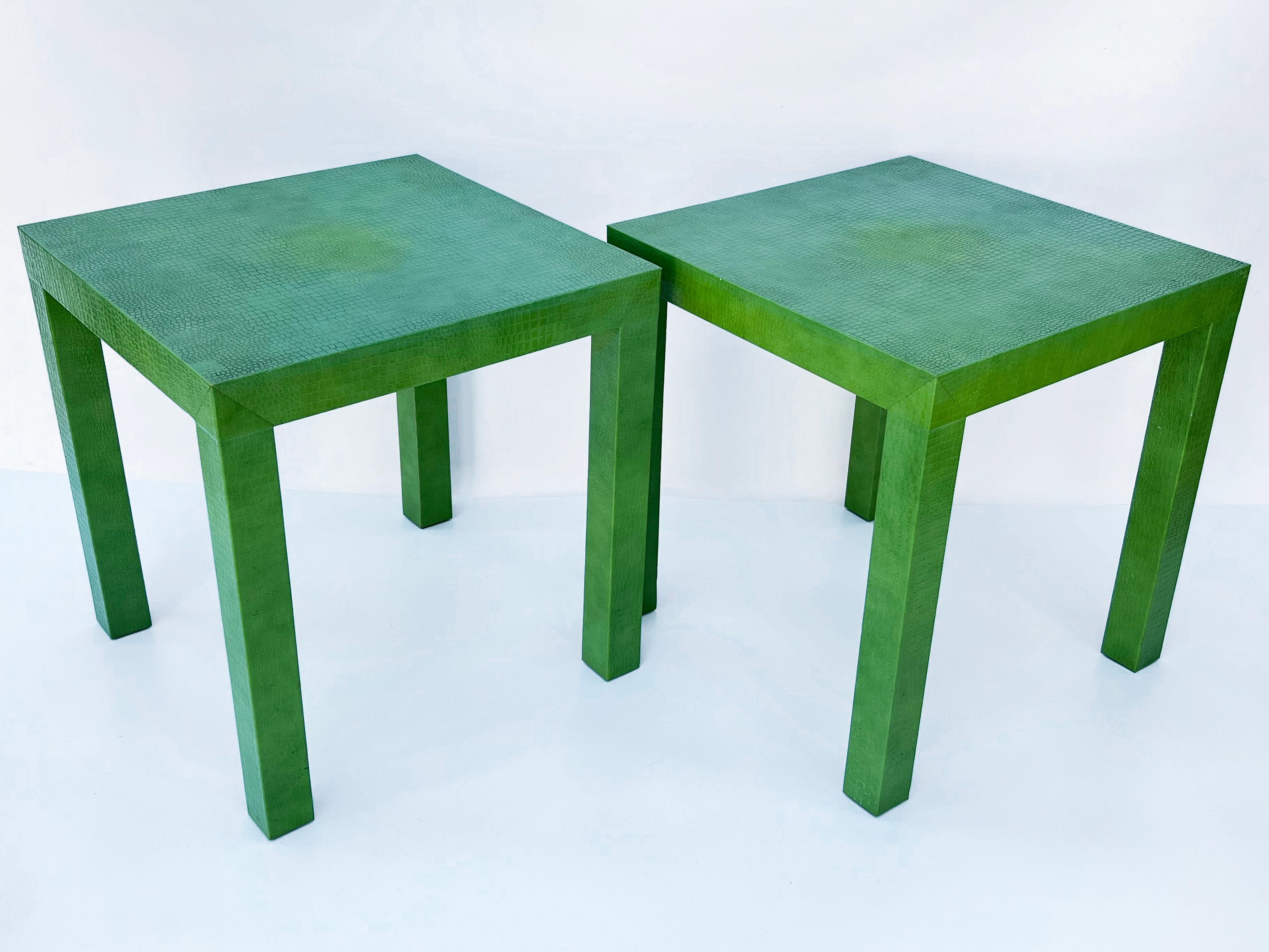 Rare pair of Parsons end tables, each clad in emerald-green, crocodile-embossed, leather. 

Please contact us for alternative shipping options. 

Stock ID: D1623
