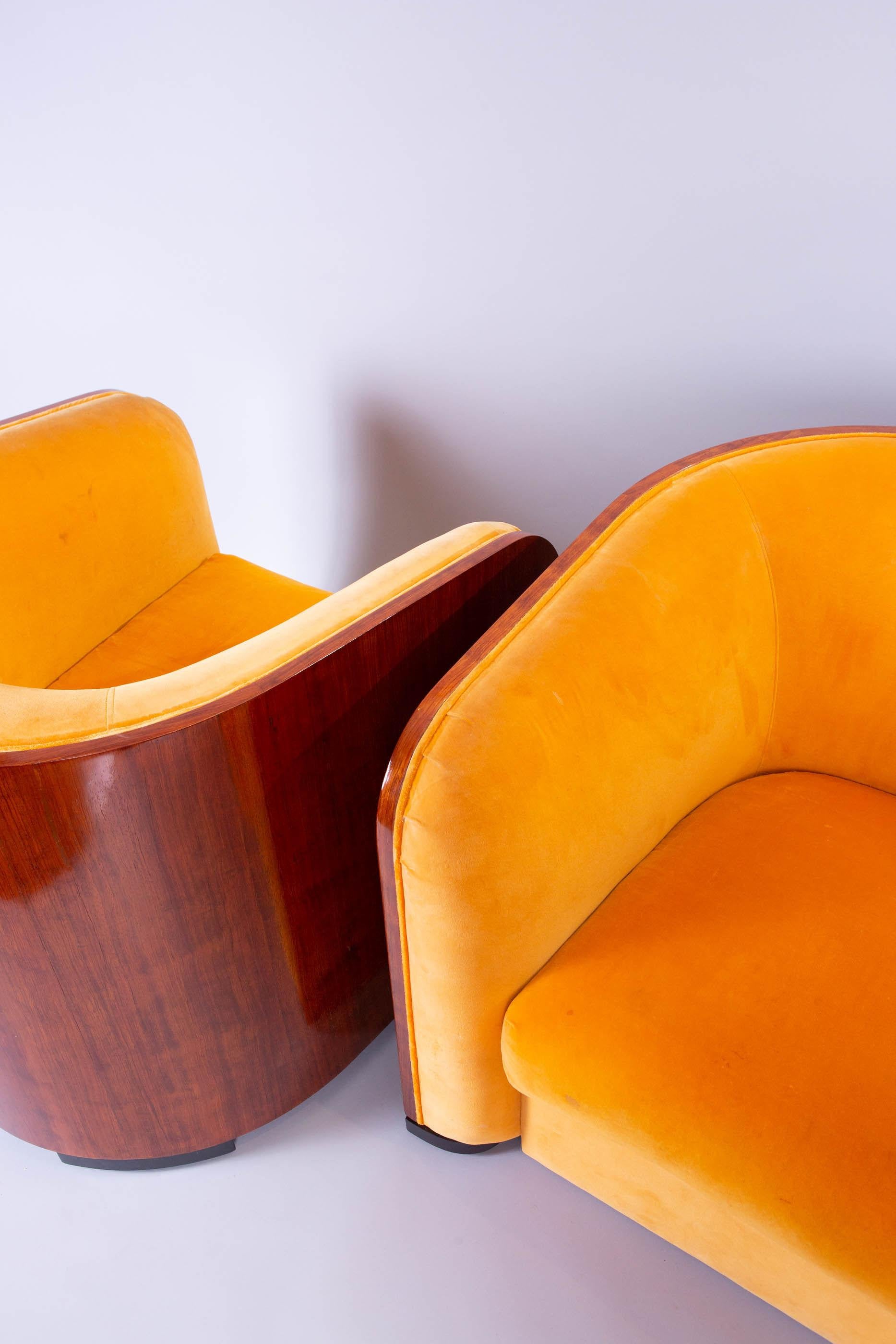 Upholstered in orange velvet, signs of normal wear on the velvet. Mahogany has been recently polished and is in excellent condition.