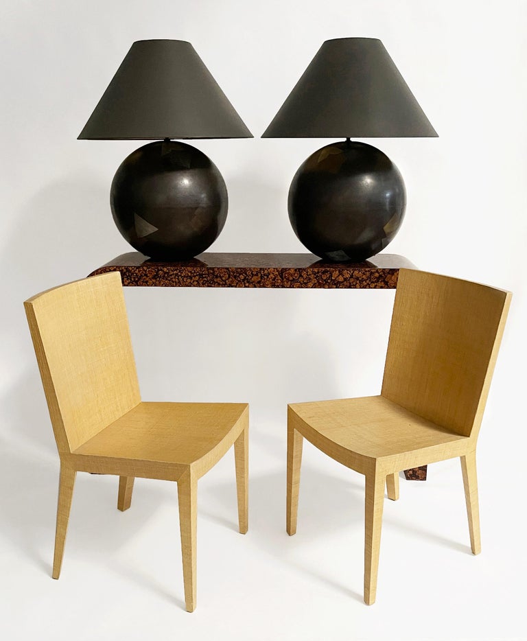Fantastic and rarely seen pair of authentic Karl Springer Ball Lamps made of patinated brass. The shades are custom made, matching original specification, and feature gold foil interior with tetre negre (dark brownish black) lacquered exterior.