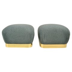 Pair of Karl Springer "Shuffle" Poufs in brass, USA c 1980s