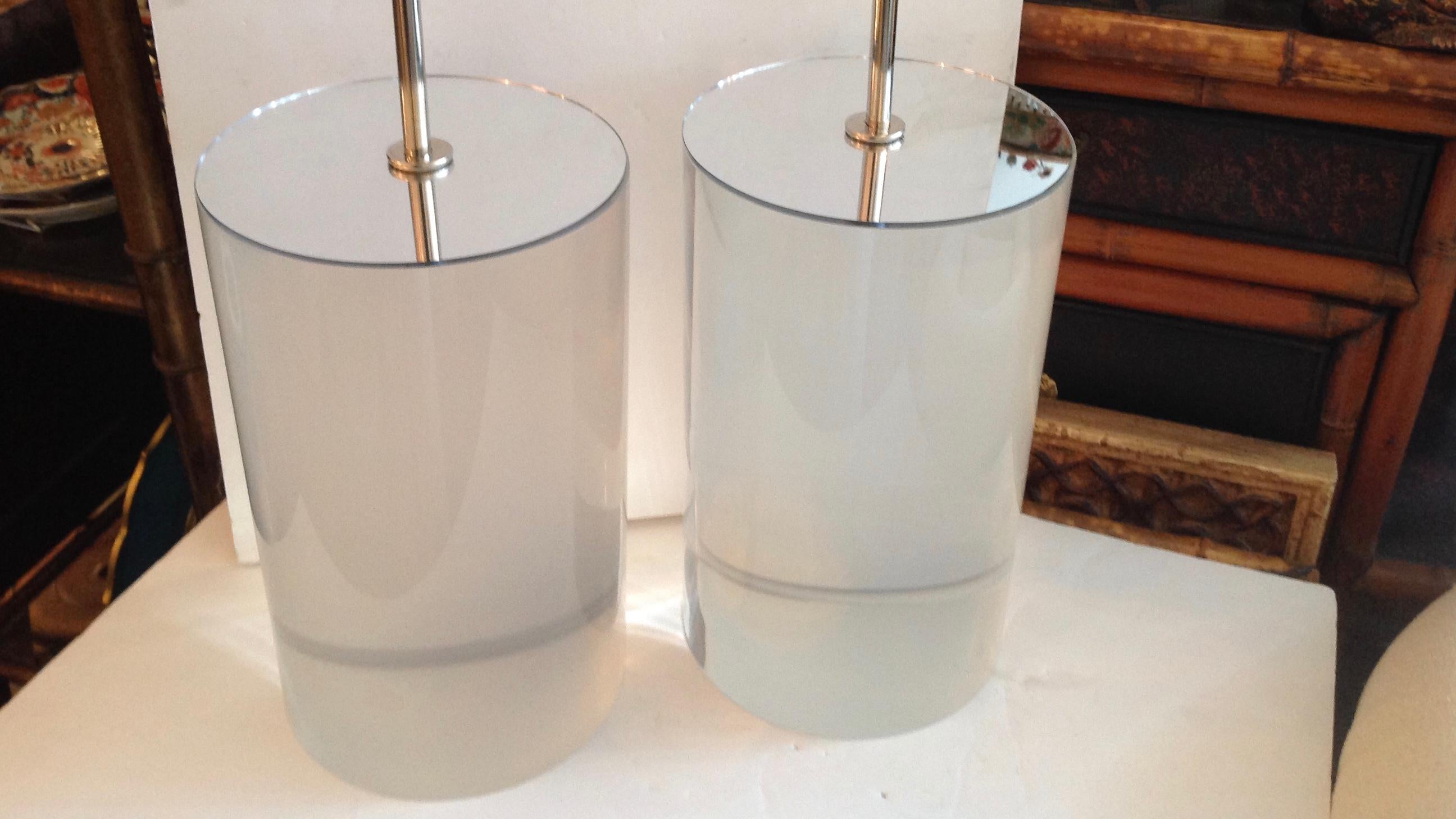 Superbly fashioned with mirrored tops and chrome-plated fittings.
Lamps measured to finials. Lucite bases are 13.5