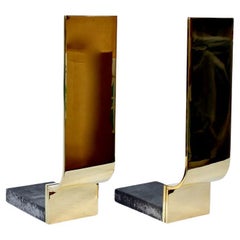 Pair of Karl Springer Style Polished Brass & Block Cast Iron Andirons, C. 1960